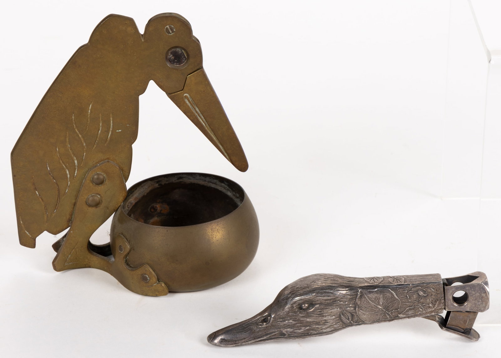 GERMAN ART NOUVEAU AND ART DECO FIGURAL CIGAR CUTTERS, LOT OF TWO (1 of 2)