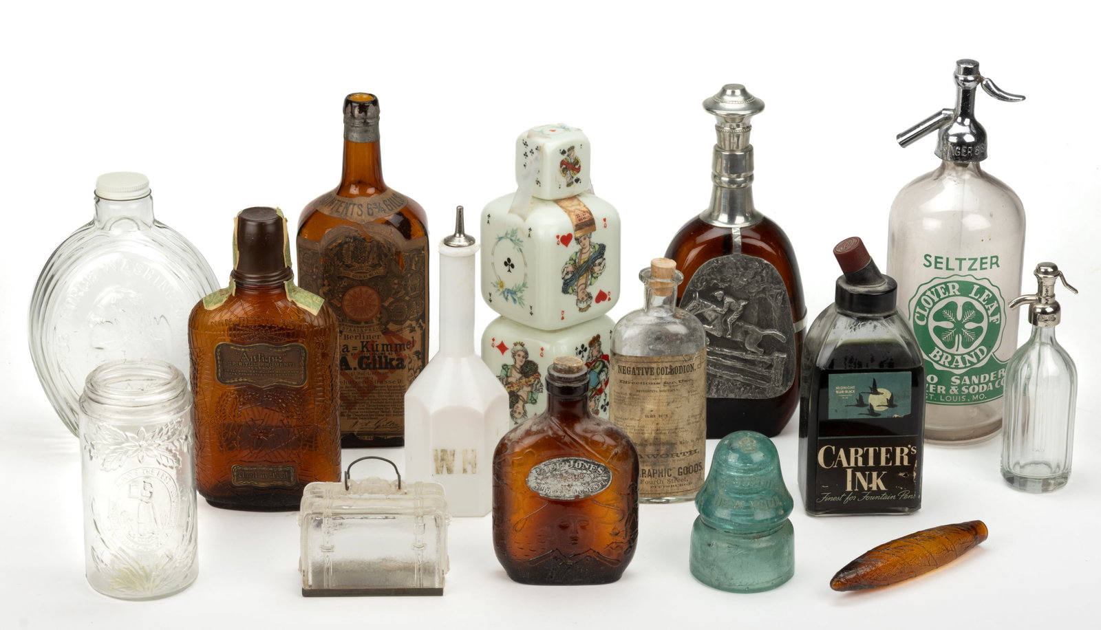 ASSORTED WHISKEY AND OTHER BOTTLES AND RELATED ARTICLES, LOT OF 15: ASSORTED WHISKEY AND OTHER BOTTLES AND RELATED ARTICLES, LOT OF 15, including an amber J. A. Gilka, Berlin Kummel bottle with original labels, a transfer-decorated milk glass Buton Brandy stacked