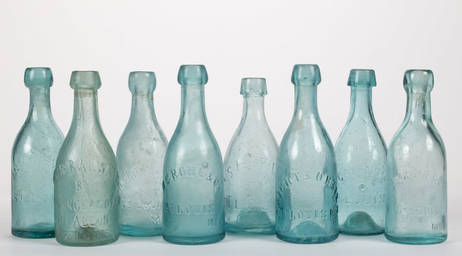 ASSORTED ST. LOUIS, MISSOURI SODA / BEER BOTTLES, LOT OF EIGHT: ASSORTED ST. LOUIS, MISSOURI SODA / BEER BOTTLES, LOT OF EIGHT, aquamarine "pony" bottles, each embossed for different bottlers including J. Cairns &