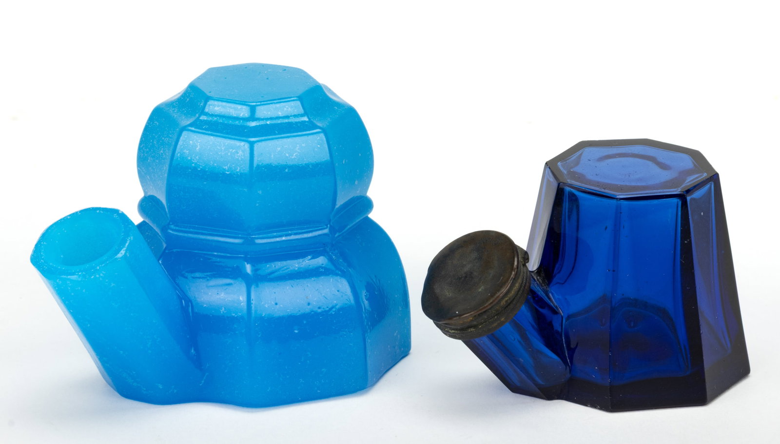 BLOWN-MOLDED FOUNTAIN / TEAKETTLE-STYLE INKWELLS, LOT OF TWO: BLOWN-MOLDED FOUNTAIN / TEAKETTLE-STYLE INKWELLS, LOT OF TWO, comprising a starch blue octagonal example with medial waist, slightly raised top, and plain base, and a cobalt blue cut-and-polished tape