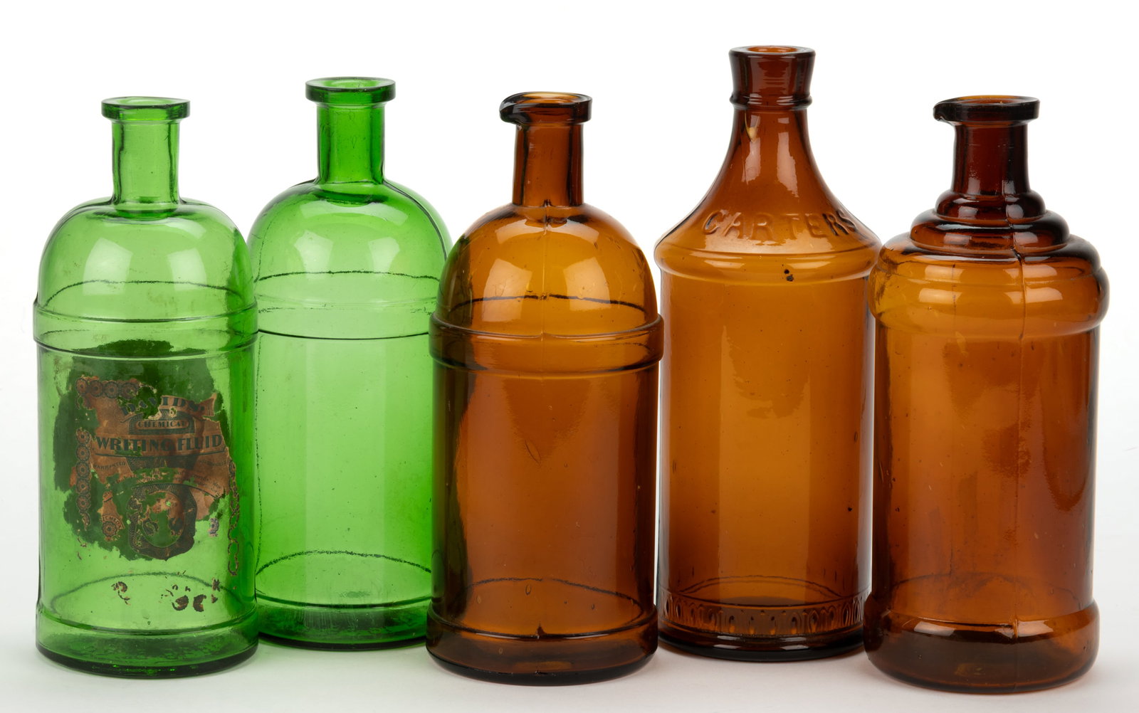 ASSORTED MASTER INK BOTTLES, LOT OF FIVE: ASSORTED MASTER INK BOTTLES, LOT OF FIVE, amber and green, each quart size, comprising a "CARTERS" with dart and petal band above the base, and four with Feb. 16th, 1886 patent date embossed
