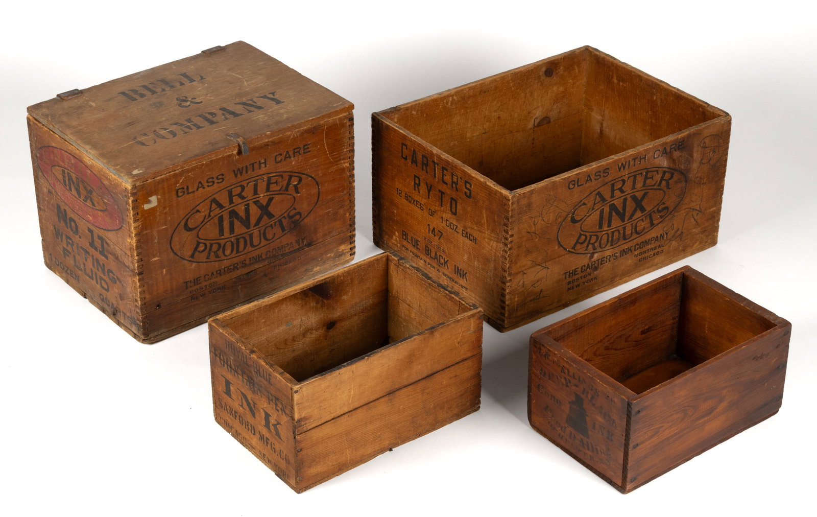 ASSORTED INK SHIPPING CRATES, LOT OF FOUR: ASSORTED INK SHIPPING CRATES, LOT OF FOUR, each of similar form, examples from Carter's, Sanford Mfg., and Allings. One retains a cover with likely-replaced leather hinges. Fourth quarter 19th/fir