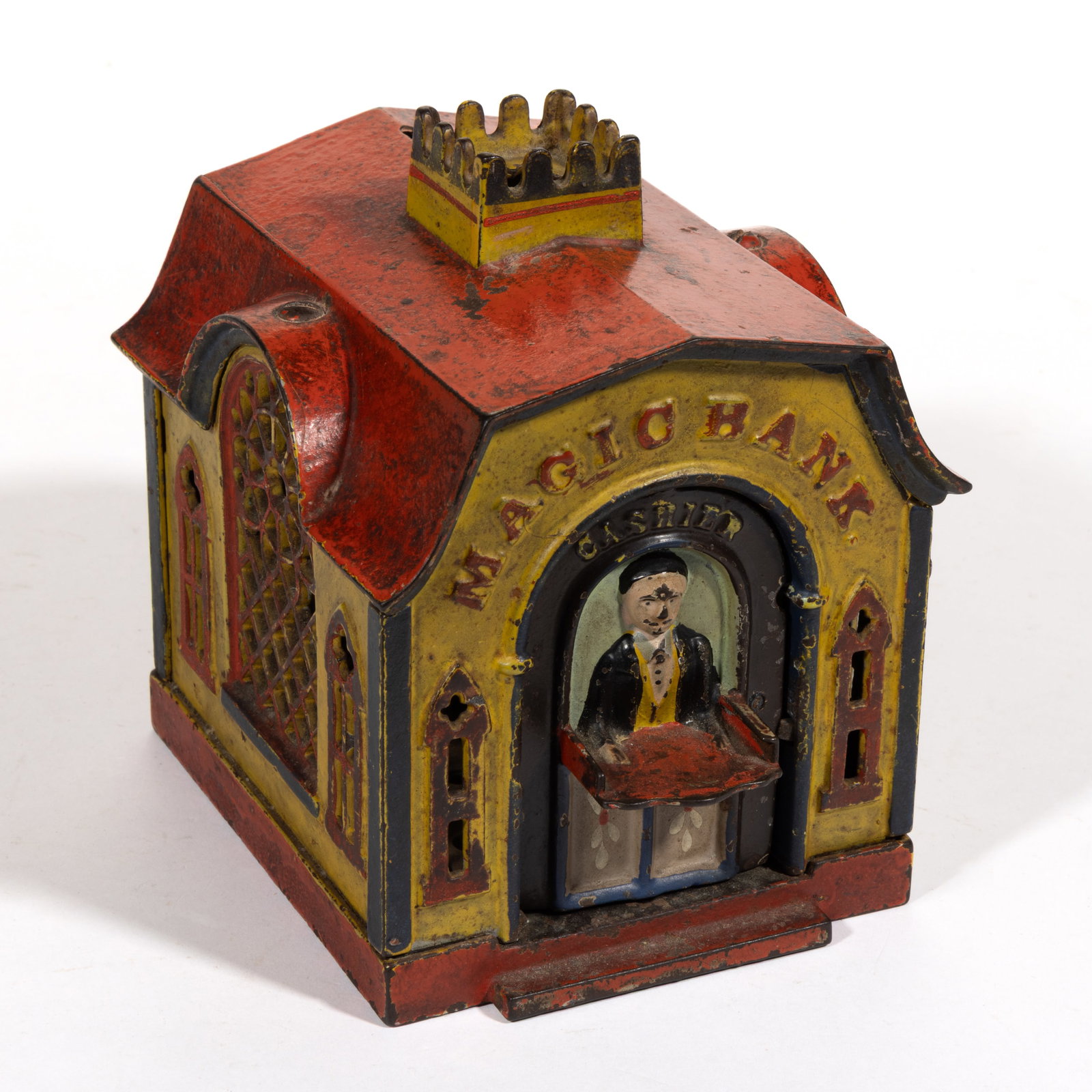 MAGIC BANK CAST-IRON MECHANICAL BANK: MAGIC BANK CAST-IRON MECHANICAL BANK, marked "PAT'D / JUNE 8 / 1875 / PAT'D / AUG 5 1873 / MAR 7 1876" to underside of base, retaining original painted surface. J. & E.