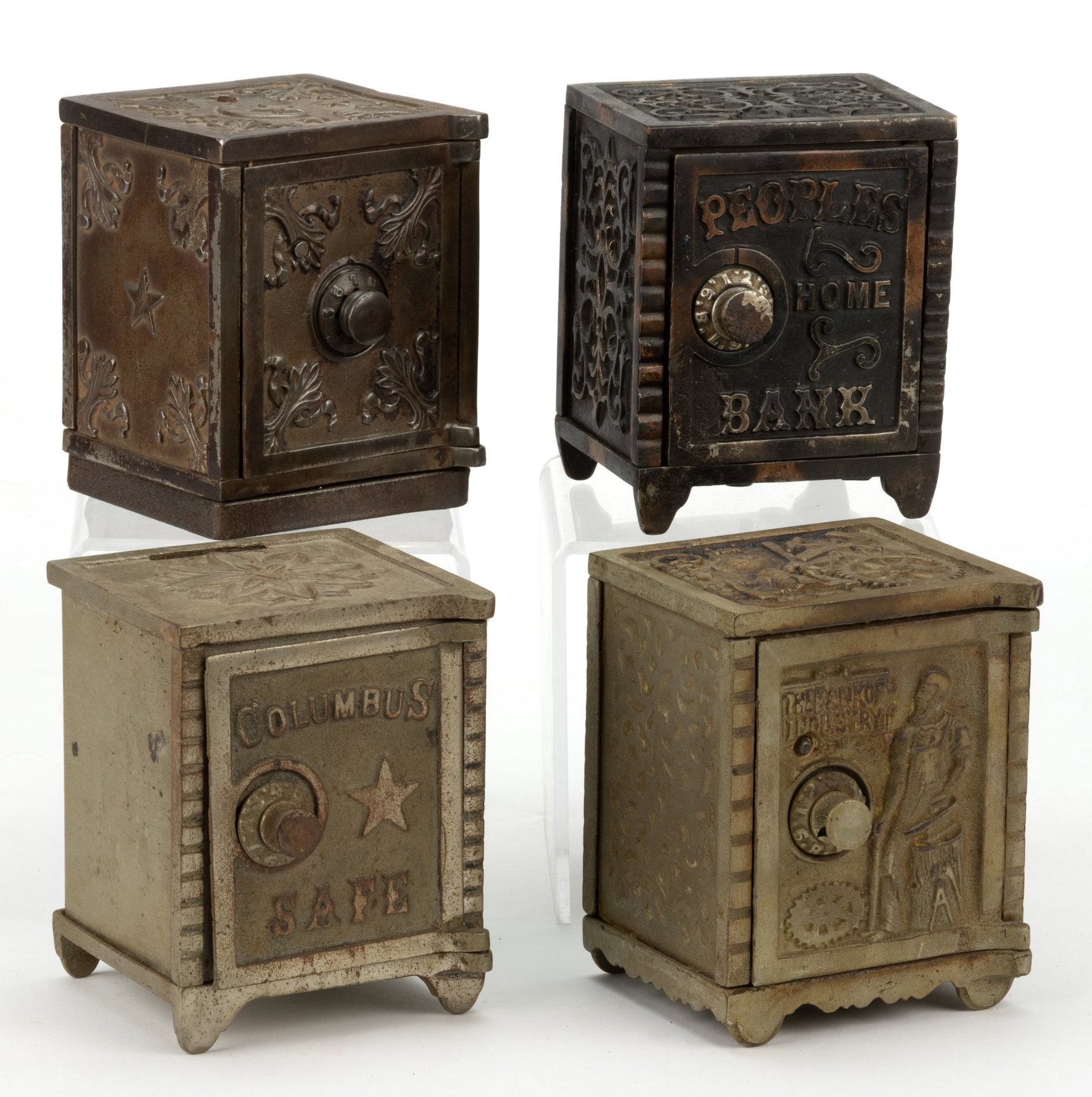 ASSORTED CAST-IRON AND METAL FIGURAL LARGE PUZZLE SAFE STILL BANKS, LOT OF FOUR (1 of 2)
