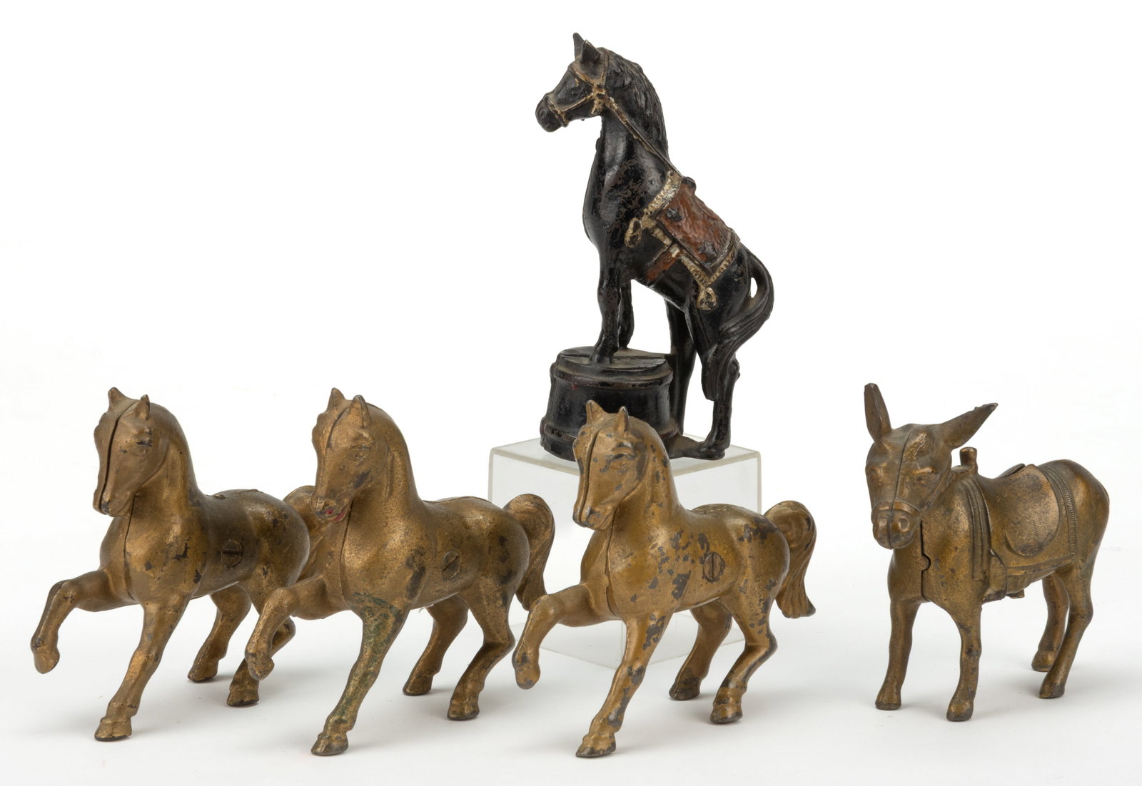 ASSORTED A.C. WILLIAMS AND ARCADE ATTRIBUTED CAST-IRON FIGURAL EQUINE STILL BANKS, LOT OF FIVE (1 of 2)