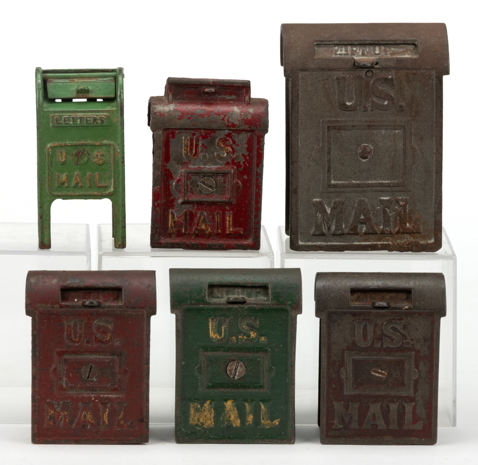 ASSORTED CAST-IRON "U. S. MAIL" STILL BANKS, LOT OF SIX: ASSORTED CAST-IRON "U. S. MAIL" STILL BANKS, LOT OF SIX, comprising of five A. C. Williams examples, including four with paint decoration of red and green, including three with gilded letter