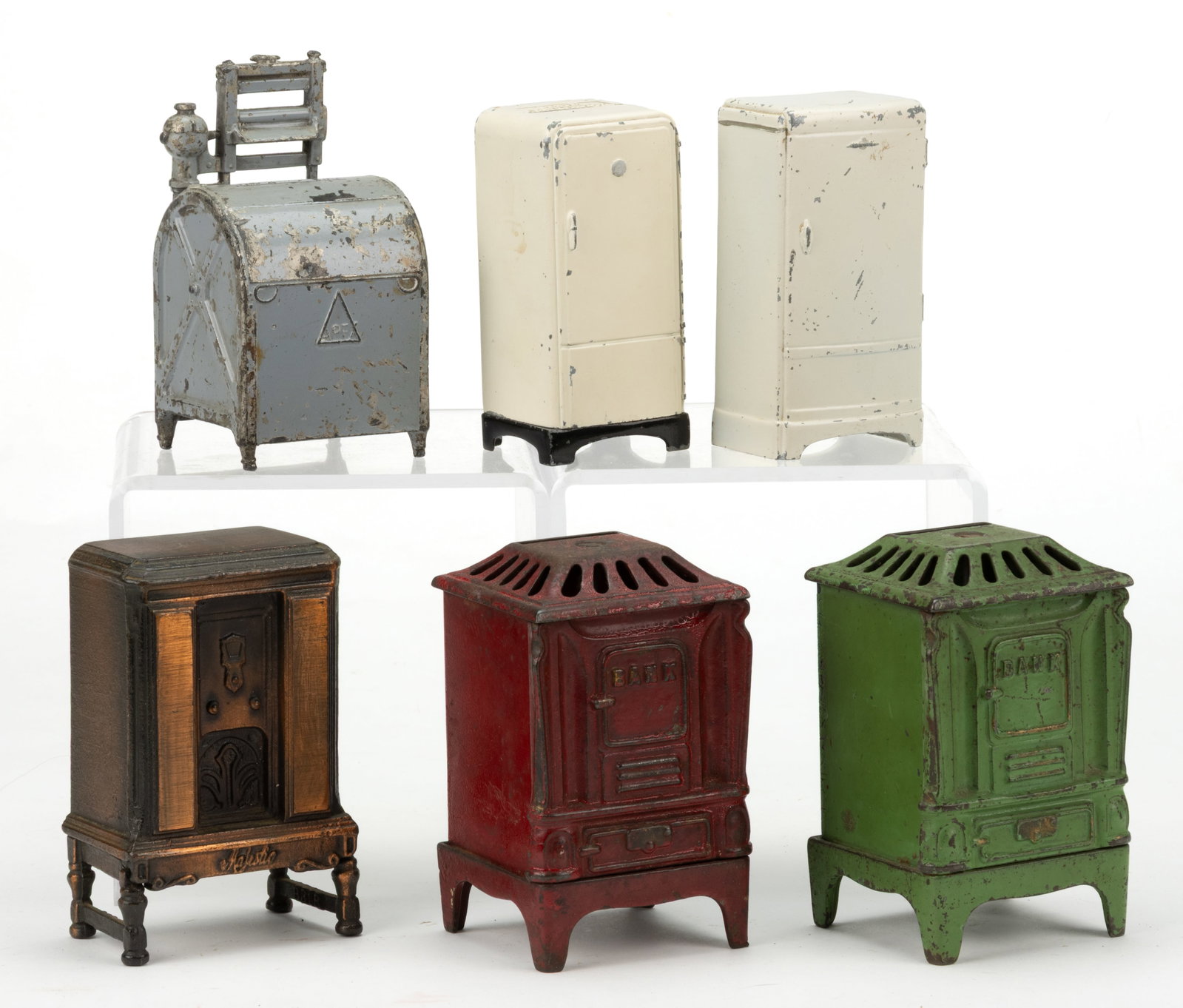 ASSORTED CAST-IRON AND WHITE METAL FIGURAL HOUSE APPLIANCES AND FURNISHINGS STILL BANKS, LOT OF SIX (1 of 2)