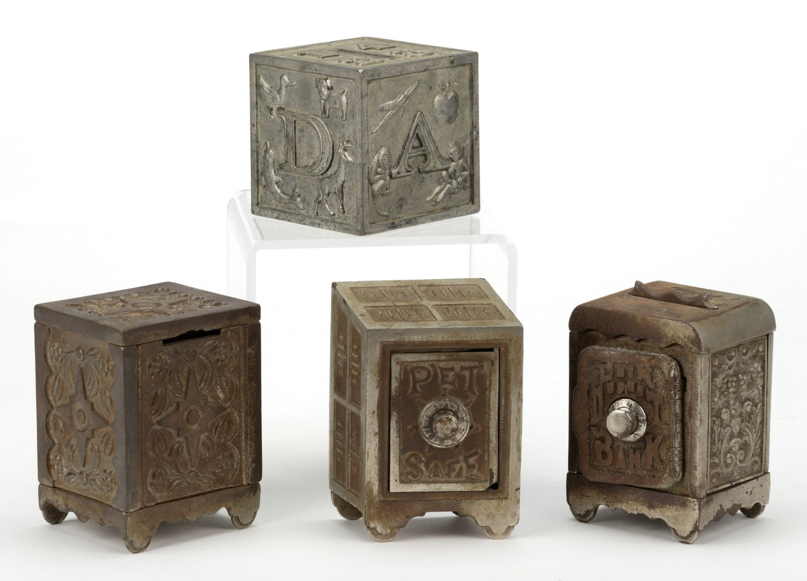 ASSORTED CAST-IRON AND METAL FIGURAL SMALL PUZZLE AND OTHER SAFE STILL BANKS, LOT OF FOUR (1 of 2)