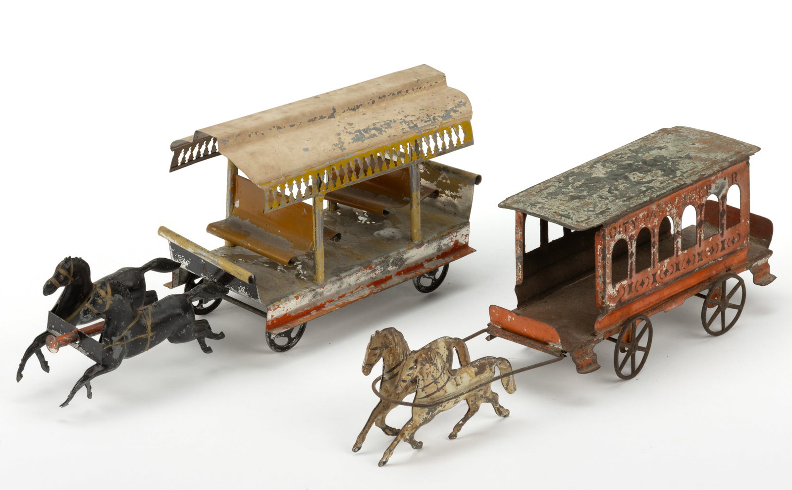 ASSORTED PAINTED TIN HORSE-DRAWN TROLLEY TOYS, LOT OF TWO (1 of 2)