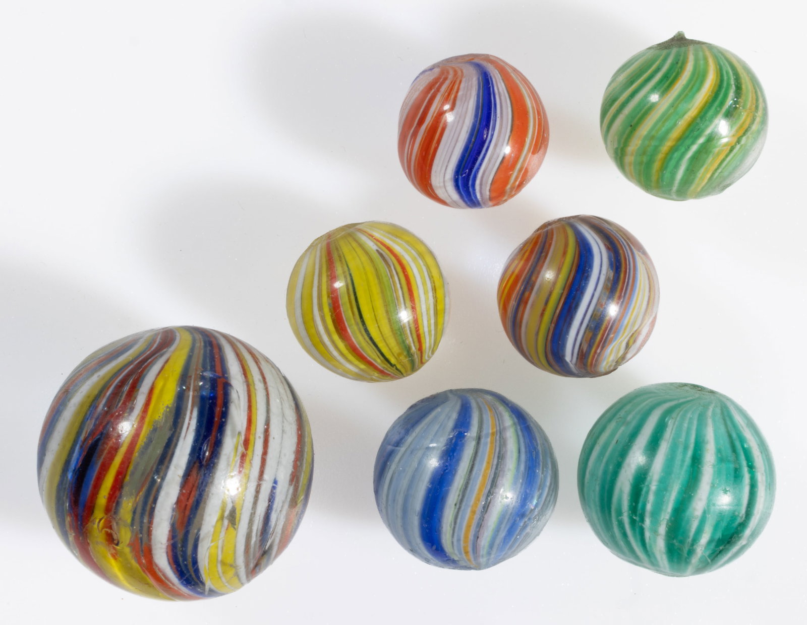 ANTIQUE ONIONSKIN MARBLES, LOT OF SEVEN (1 of 2)