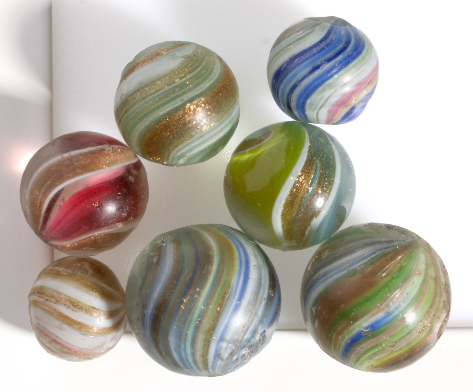 ANTIQUE LUTZ MARBLES, LOT OF SEVEN (1 of 1)