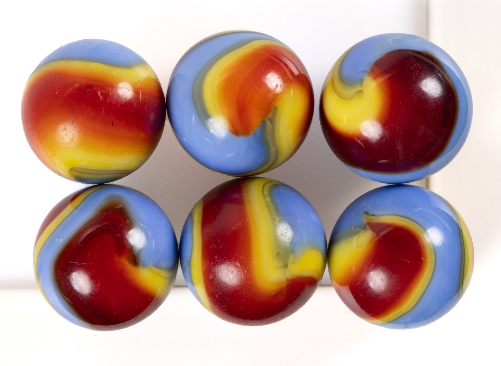 AKRO AGATE SUPERMAN CORKSCREW MACHINE-MADE MARBLES, LOT OF SIX (1 of 1)