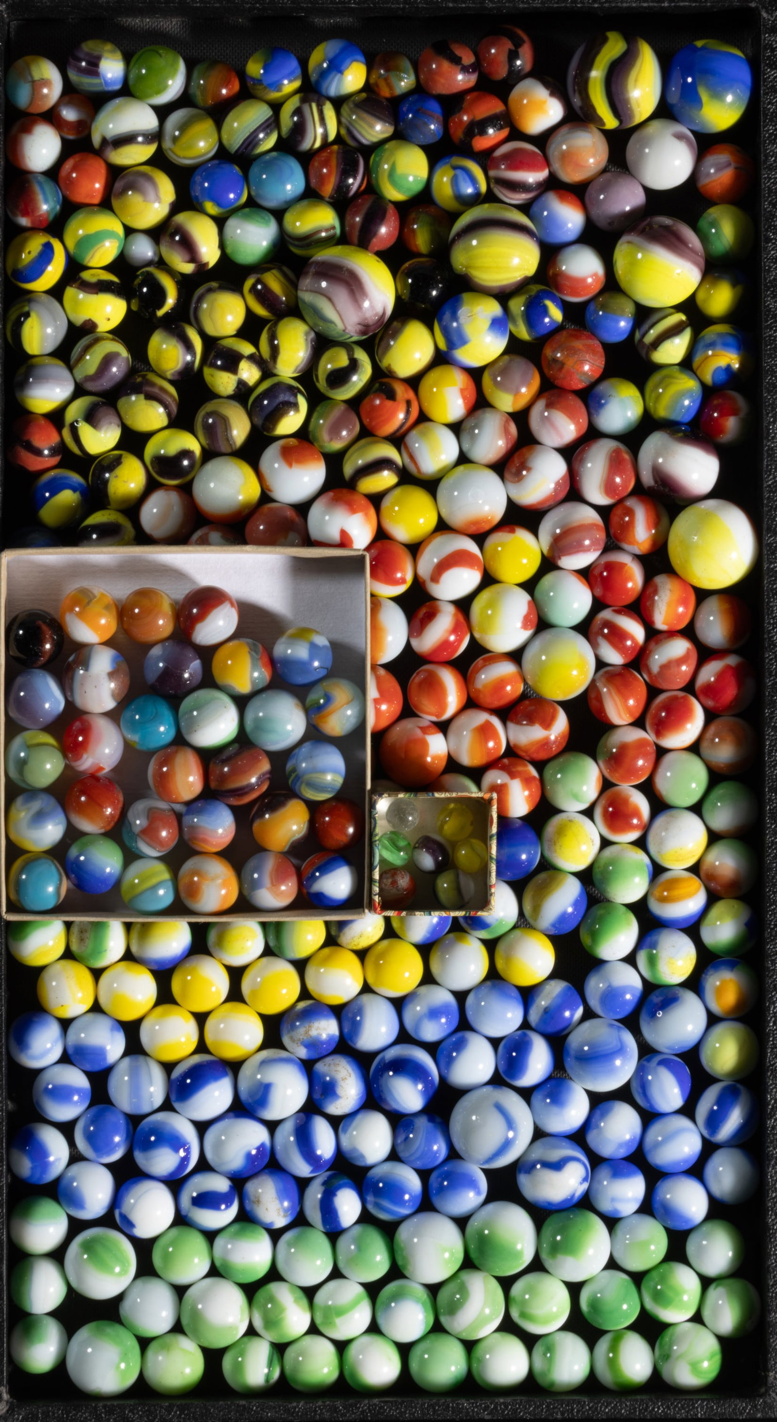 ASSORTED MARBLE KING RAINBOW MACHINE-MADE MARBLES, UNCOUNTED LOT: ASSORTED MARBLE KING RAINBOW MACHINE-MADE MARBLES, UNCOUNTED LOT, opaque white base color, including Bumblebees, Cub Scouts, Girl Scouts, Wasps, Watermelon, Dragonfly, tri-colors, and multi-color