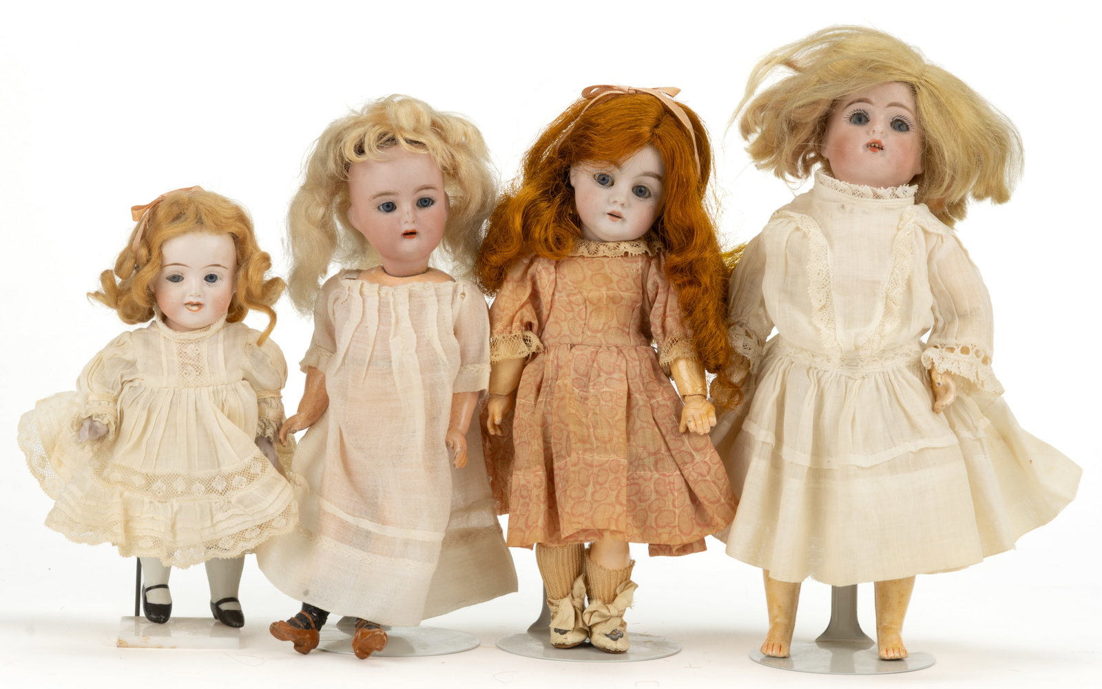 ASSORTED AMERICAN AND GERMAN BISQUE-HEAD DOLLS, LOT OF FOUR (1 of 2)