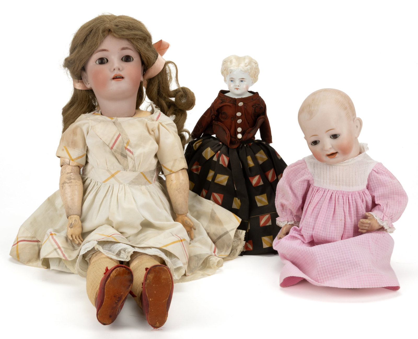 ASSORTED GERMAN BISQUE AND CHINA HEAD DOLLS, LOT OF THREE (1 of 3)