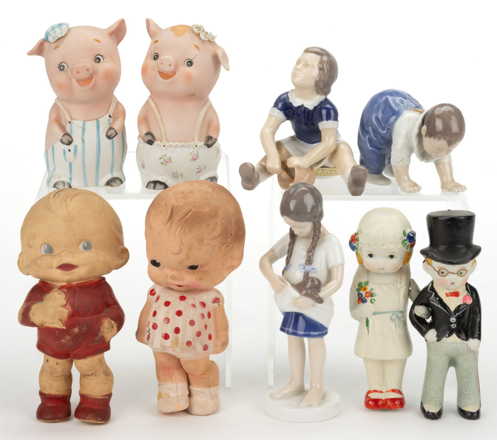 ASSORTED CERAMIC AND RUBBER FIGURAL DOLLS AND ARTICLES, LOT OF NINE: ASSORTED CERAMIC AND RUBBER FIGURAL DOLLS AND ARTICLES, LOT OF NINE, including three porcelain Danish B & G Royal Copenhagen figures, depicting a young girl with a cat, base marked 