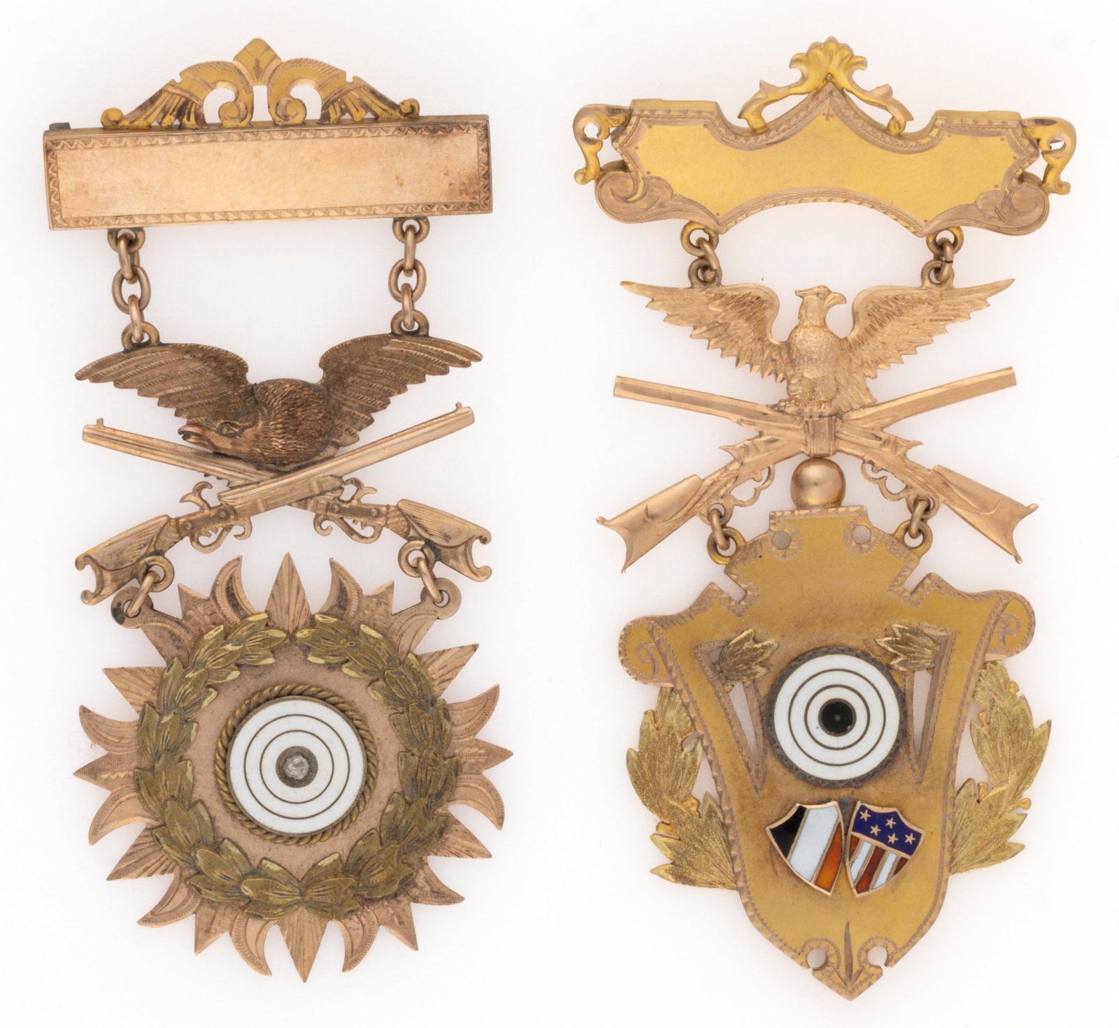 ANTIQUE RIFLEMAN / SHOOTING 10K GOLD MEDALS, LOT OF TWO: ANTIQUE RIFLEMAN / SHOOTING 10K GOLD MEDALS, LOT OF TWO, each having a bar pin with scrolled details, below with a spread-wing eagle perched on crossed rifles, shaped lower panel featuring an enameled