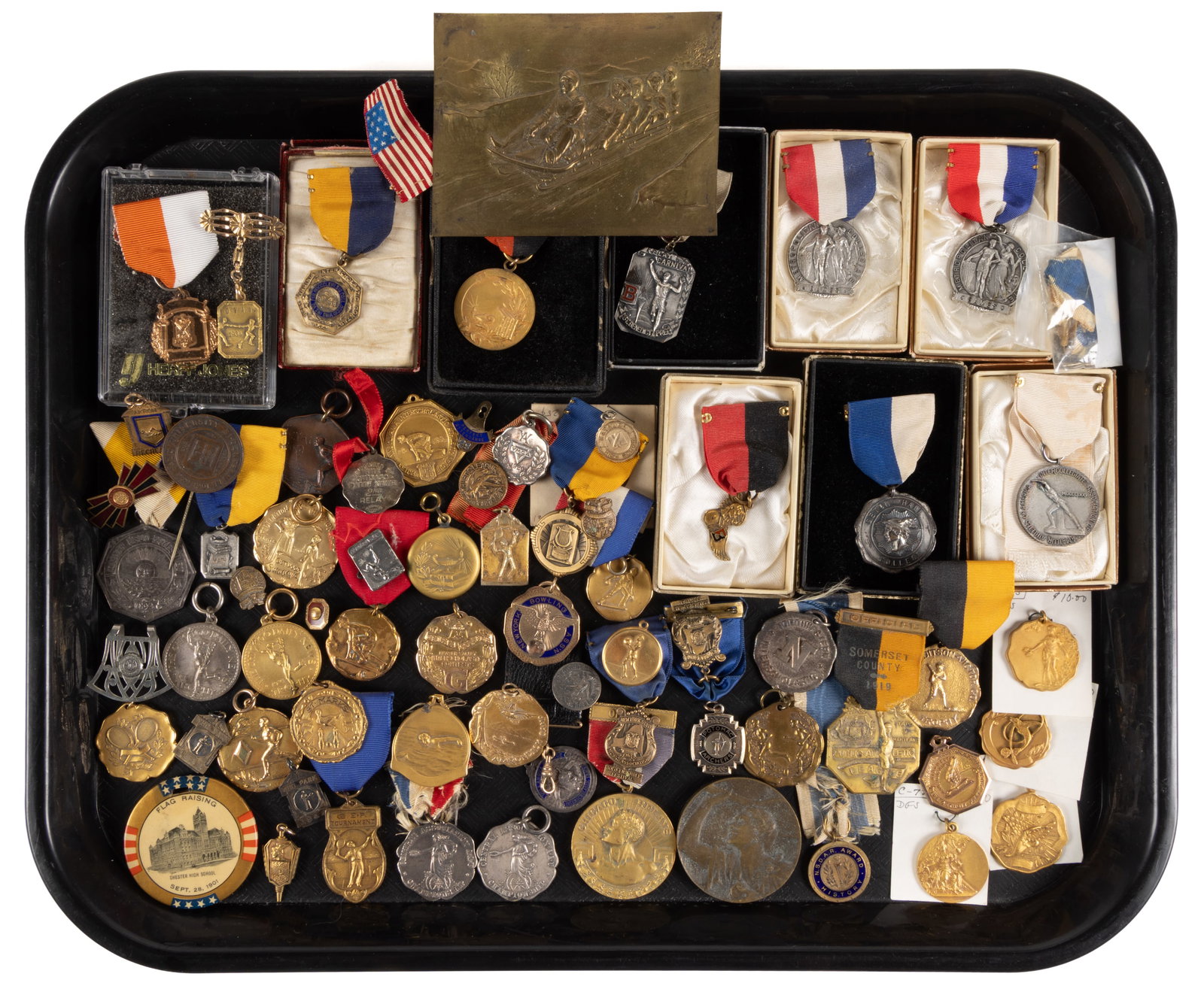ASSORTED SPORTS AND ACADEMIC MEDALS AND RELATED ARTICLES, LARGE UNCOUNTED LOT: ASSORTED SPORTS AND ACADEMIC MEDALS AND RELATED ARTICLES, LARGE UNCOUNTED LOT, including more than ten marked "STERLING" examples, a large number of gold-filled and gold-plated examples, a s