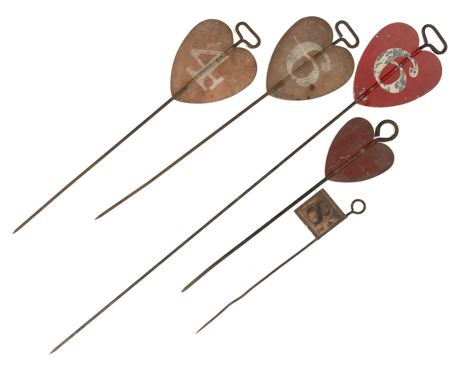 AMERICAN SHEET- AND CAST-IRON GOLF PIN / HOLE MARKERS, LOT OF FIVE: AMERICAN SHEET- AND CAST-IRON GOLF PIN / HOLE MARKERS, LOT OF FIVE, comprising four in the form of a heart, one with a rectangular form. Several with painted numbers. Late 19th/early 20th century