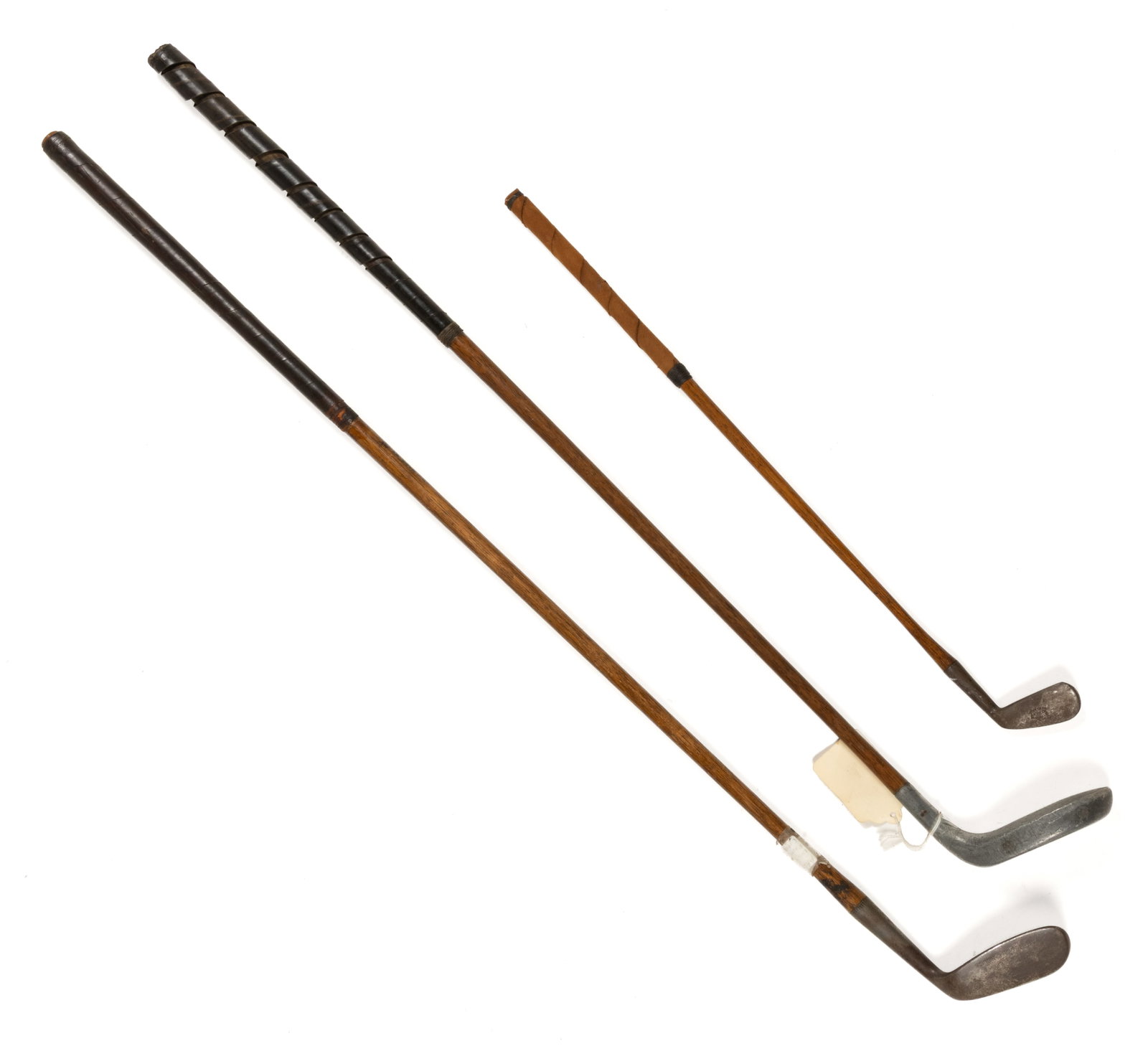 ASSORTED HICKORY-SHAFT GOLF CLUBS, LOT OF THREE: ASSORTED HICKORY-SHAFT GOLF CLUBS, LOT OF THREE, comprising a Burke child's golf club; a Crawford, McGregor, & Canby Co., Dayton, OH example; and a Mills aluminum "Y" model putter. F