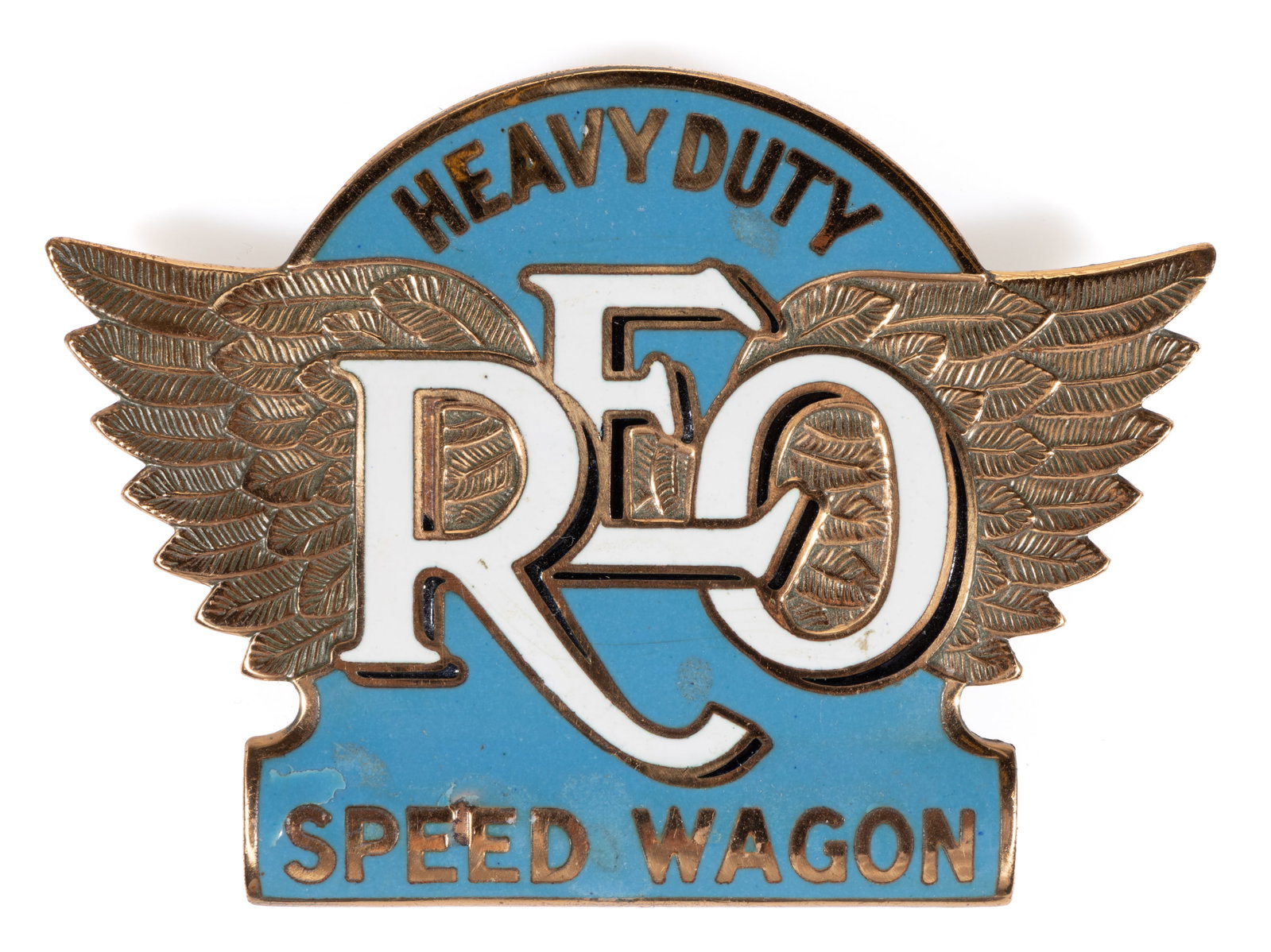 REO MOTOR CAR CO. "HEAVY DUTY / REO / SPEED WAGON" AUTOMOBILE / TRUCK / VEHICLE RADIATOR / GRILL: REO MOTOR CAR CO. "HEAVY DUTY / REO / SPEED WAGON" AUTOMOBILE / TRUCK / VEHICLE RADIATOR / GRILL EMBLEM, polished brass with large extended wings, center with pale blue enameling and white e