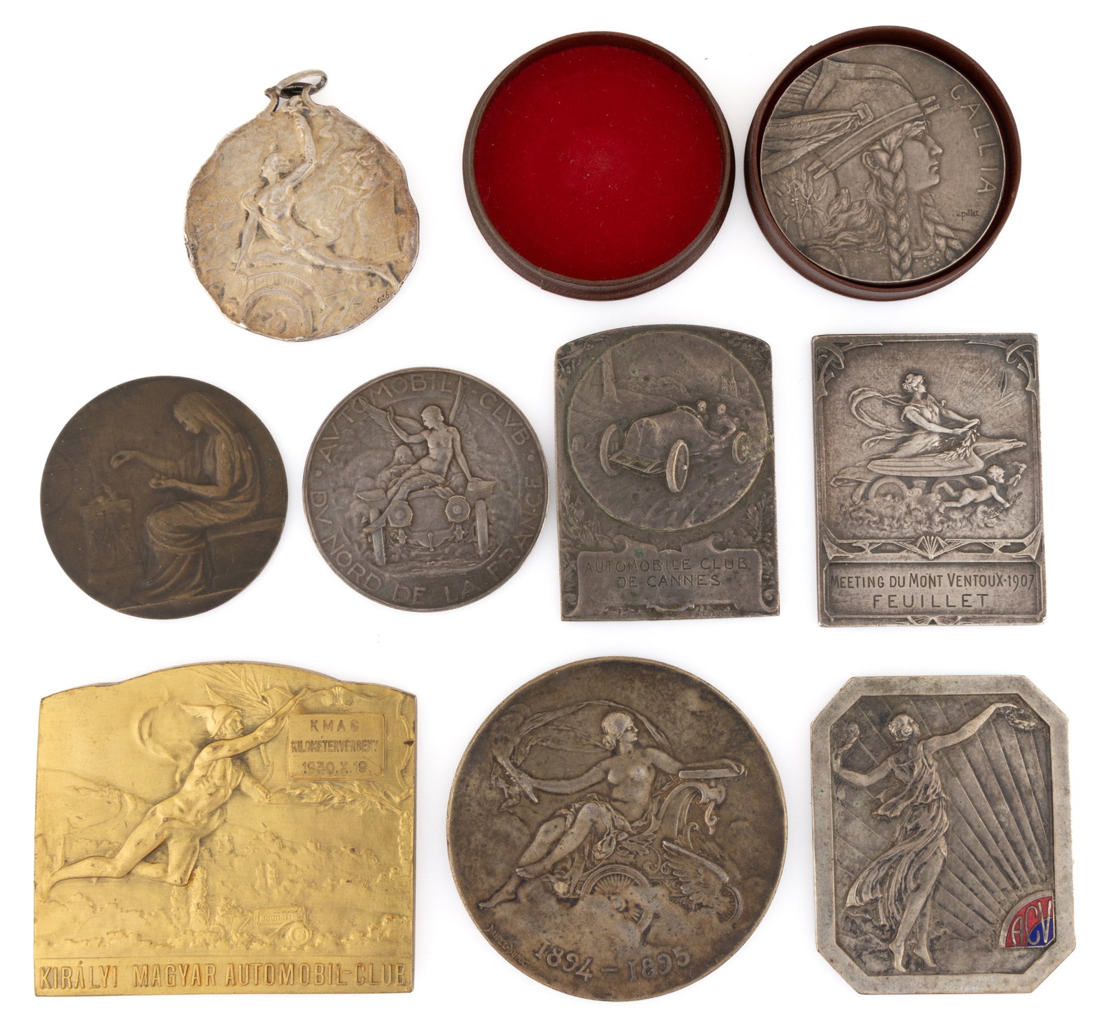 ASSORTED EUROPEAN AUTOMOBILE BRONZE AND SILVER MEDALS, LOT OF NINE: ASSORTED EUROPEAN AUTOMOBILE BRONZE AND SILVER MEDALS, LOT OF NINE, including a round silver (of unknown fineness) example in its original box with a stylized gear-like object in the center lette