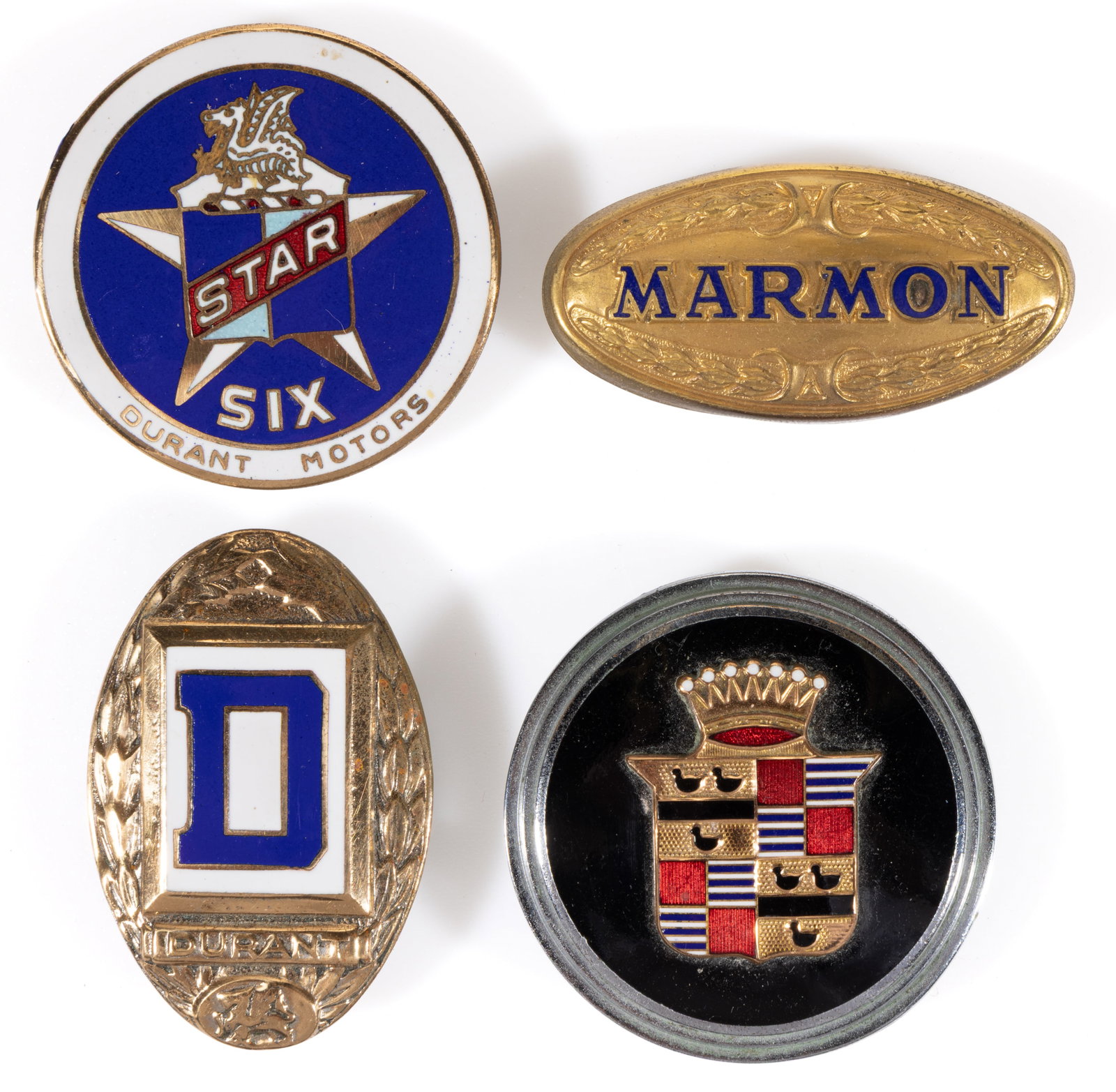 ASSORTED MANUFACTURERS AUTOMOBILE / CAR / VEHICLE RADIATOR EMBLEMS, LOT OF FOUR: ASSORTED MANUFACTURERS AUTOMOBILE / CAR / VEHICLE RADIATOR EMBLEMS, LOT OF FOUR, each of round or ovoid form, comprising two Durant examples, including a Star Six, a Cadillac, and a Marmon, three exam
