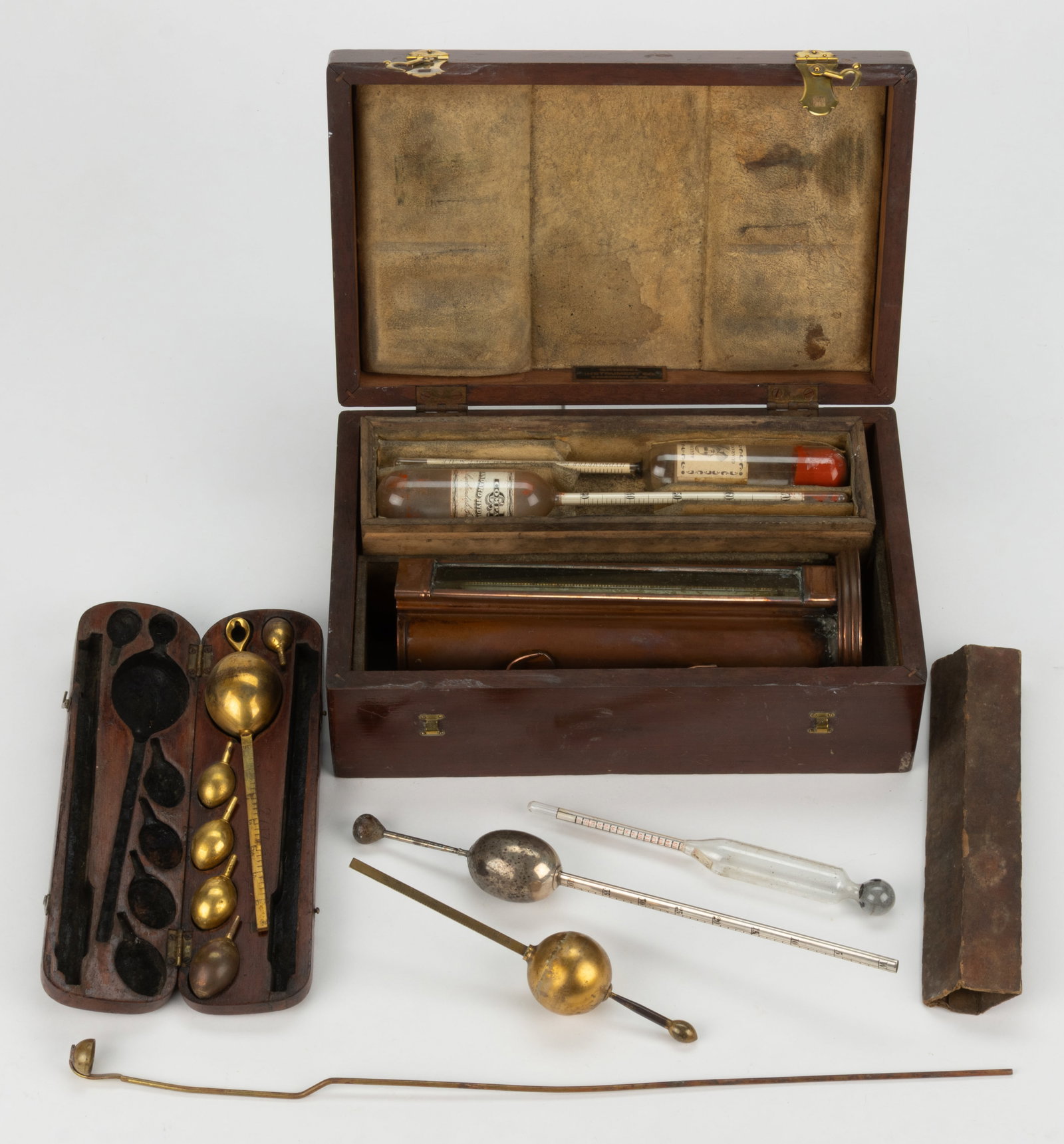ASSORTED SPIRIT HYDROMETER SETS AND RELATED INSTRUMENTS, LOT OF SIX: ASSORTED SPIRIT HYDROMETER SETS AND RELATED INSTRUMENTS, LOT OF SIX, including a cased hydrometer set possibly by the Otto Haak Co.; a smaller, likely English, saccharometer or hydrometer set; a 