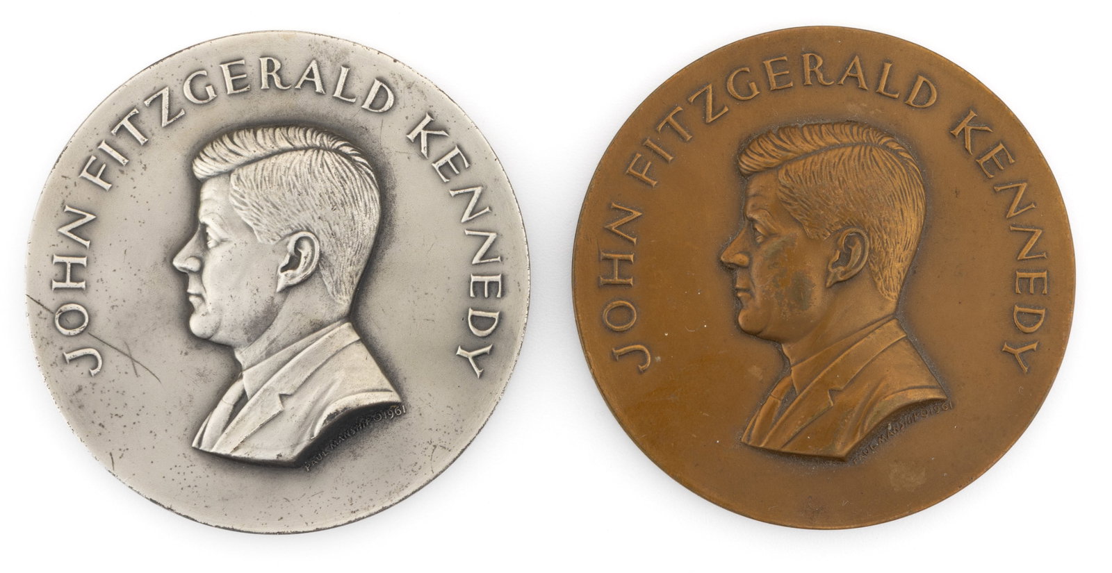 JOHN F. KENNEDY .999 SILVER AND BRONZE INAUGURAL COMMEMORATIVE MEDALS, LOT OF TWO: JOHN F. KENNEDY .999 SILVER AND BRONZE INAUGURAL COMMEMORATIVE MEDALS, LOT OF TWO, both of the same form featuring the president's profile with his name "JOHN FITZGERALD KENNEDY" along t