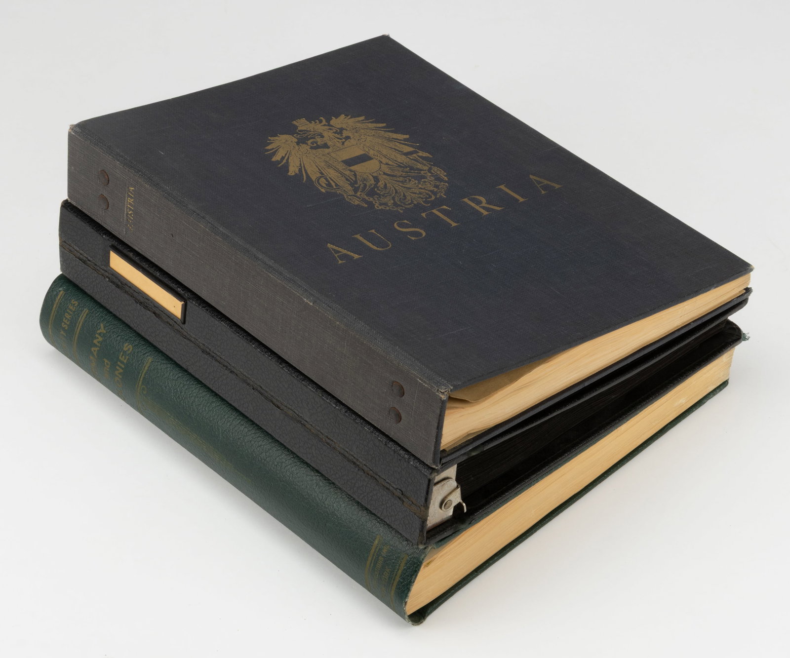AUSTRIA AND GERMANY POSTAGE STAMP ALBUMS, LOT OF THREE (1 of 7)