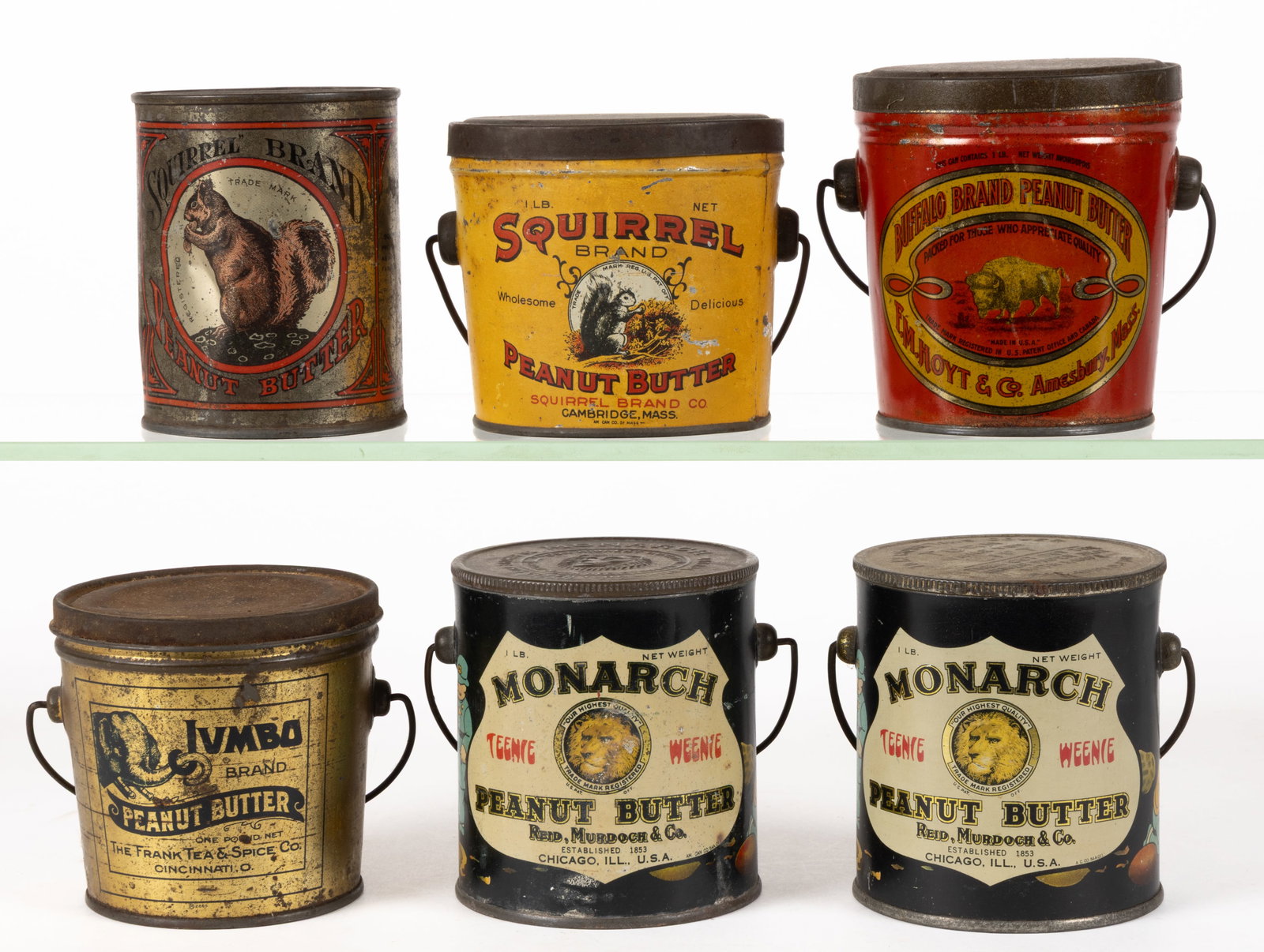 ASSORTED LITHOGRAPHED PEANUT BUTTER TINS, LOT OF SIX: ASSORTED LITHOGRAPHED PEANUT BUTTER TINS, LOT OF SIX, various makers, each of one pound size with cover and bail handle; comprising of two "Monarch" with Teenie Weenie graphics and having ad