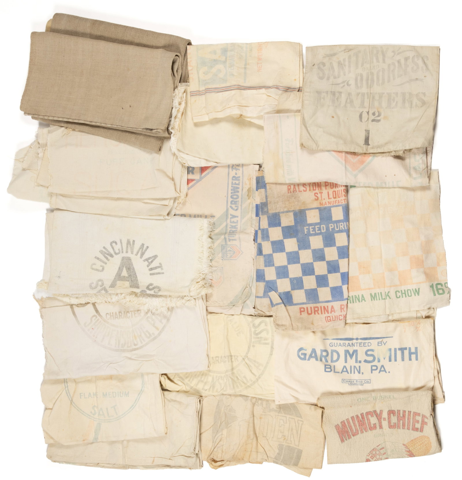 ANTIQUE / VINTAGE GRAIN AND FEEDSACK BAGS, LOT OF 20: ANTIQUE / VINTAGE GRAIN AND FEEDSACK BAGS, LOT OF 20, many with bleached logos / text; including two "Master Mix" feedsacks from McMillen Feed Mills, a division of Central Soya Co., Inc.; tw