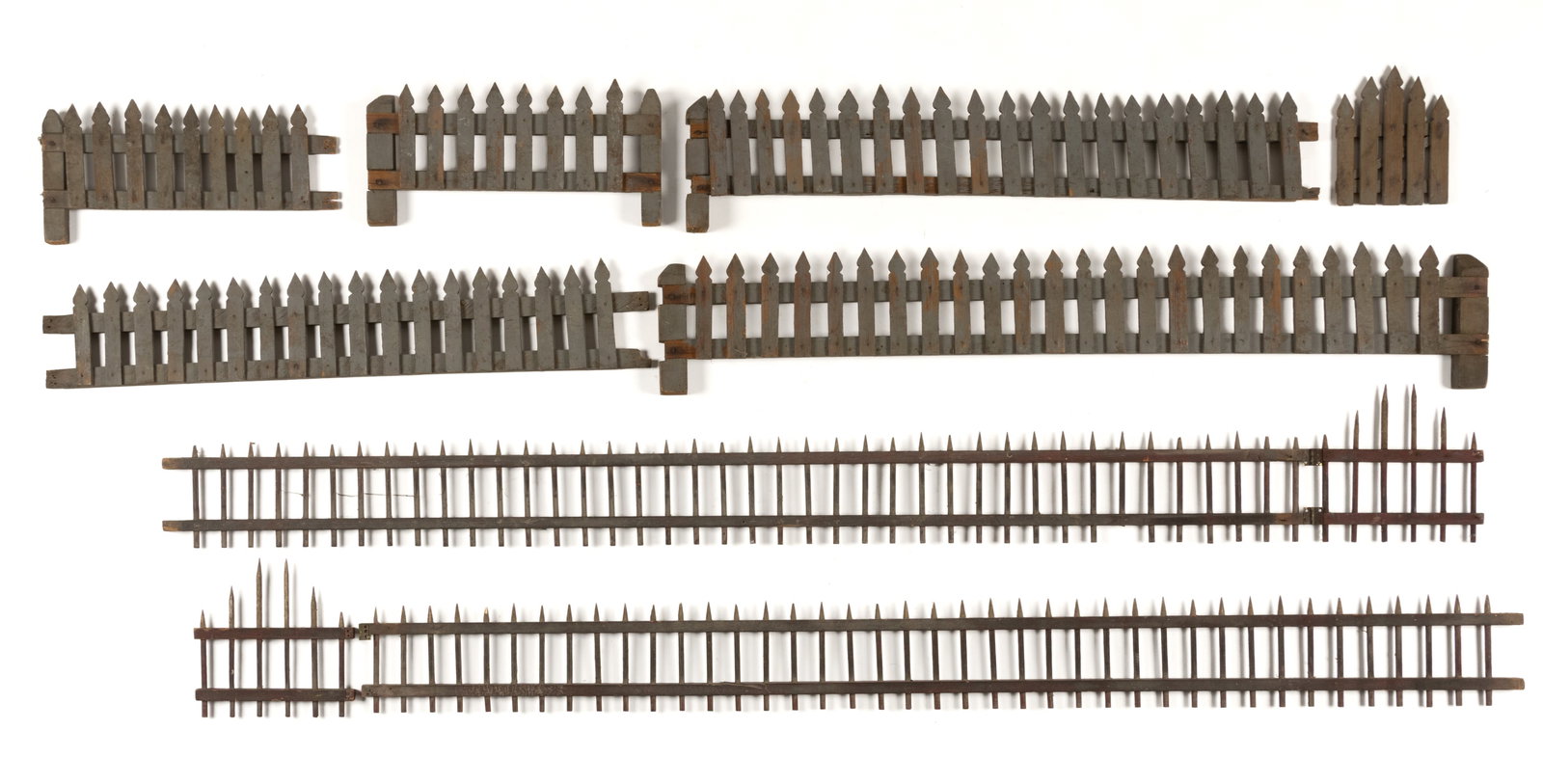 AMERICAN FOLK ART PAINTED CHRISTMAS TREE FENCES, LOT OF NINE SECTIONS: AMERICAN FOLK ART PAINTED CHRISTMAS TREE FENCES, LOT OF NINE SECTIONS, from two fences, comprising six pieces of a fence with cut-out pickets and nailed posts; and three pieces from a fence with point