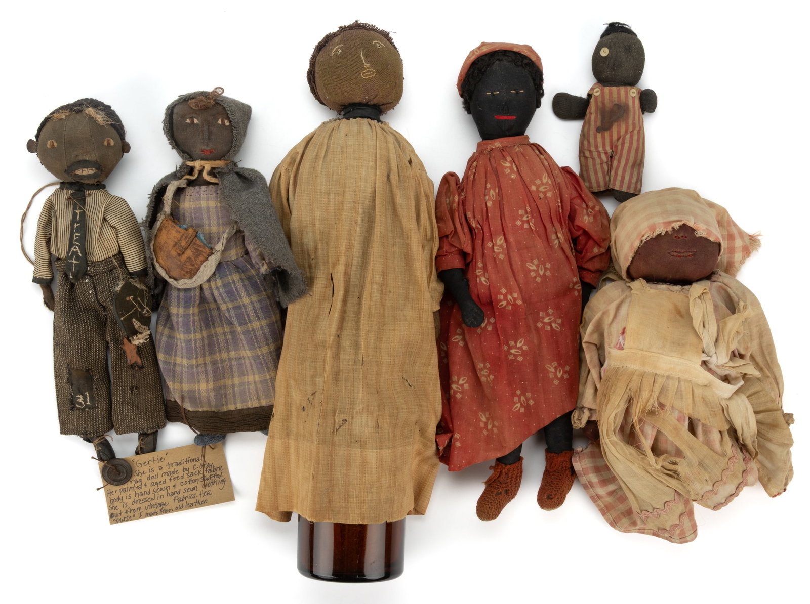 AMERICAN FOLK ART CLOTH / RAG BLACK AMERICANA DOLLS, LOT OF SIX: AMERICAN FOLK ART CLOTH / RAG BLACK AMERICANA DOLLS, LOT OF SIX, cloth/cotton and excelsior/straw stuffed bodies, five examples with hand-stitched head and having facial 