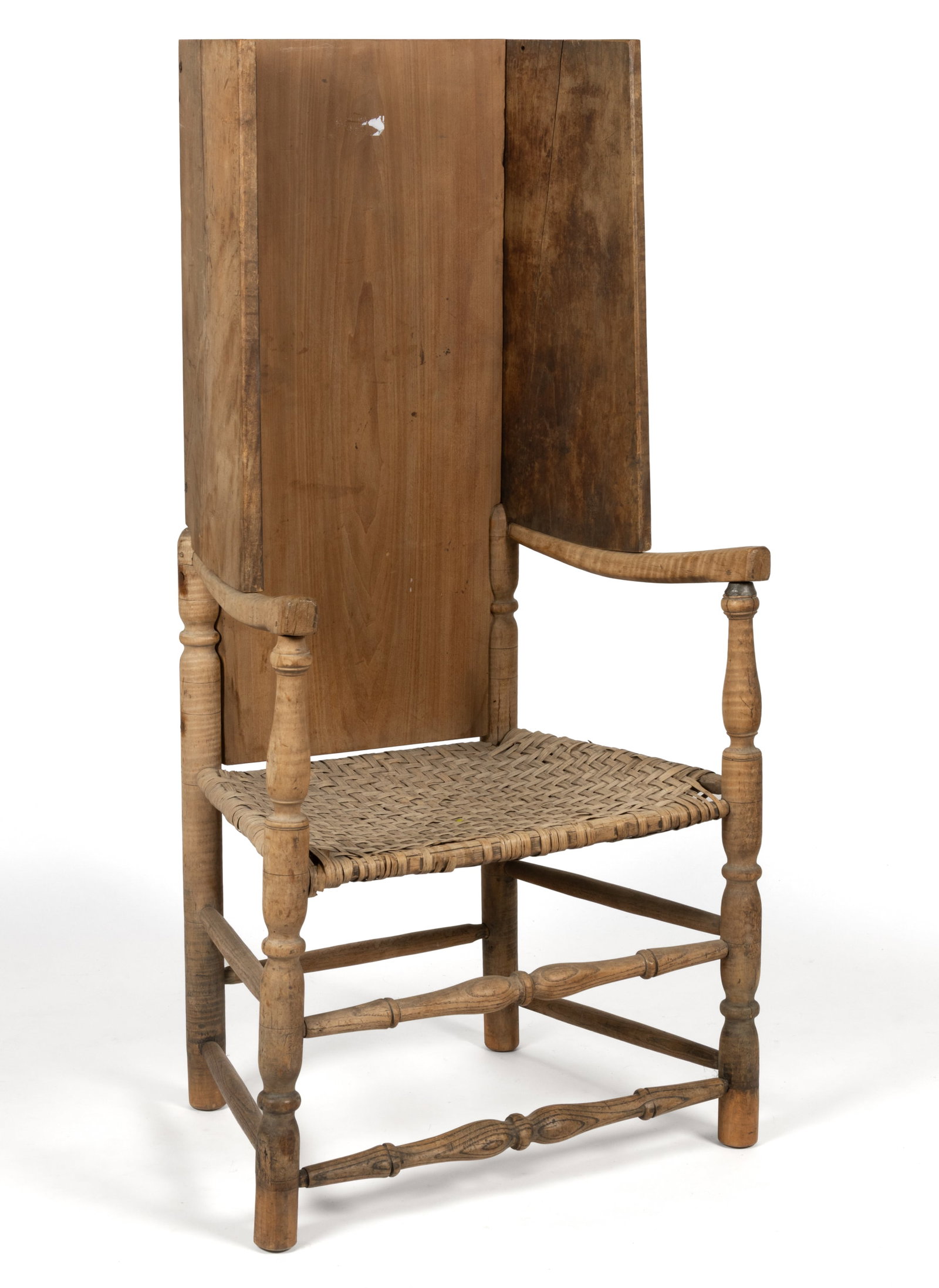 NEW ENGLAND FIGURED MAPLE MAKE-DO ARMCHAIR: NEW ENGLAND FIGURED MAPLE MAKE-DO ARMCHAIR, maple, poplar, and oak/hickory, the rectangular poplar back with canted wings over turned posts, shaped arms, and the likely-original splint seat, the
