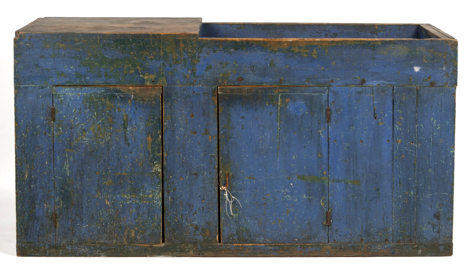 AMERICAN PAINTED PINE OVERSIZED DRYSINK: AMERICAN PAINTED PINE OVERSIZED DRYSINK, nailed construction, one end with a rectangular work surface, the other with a shallow well over two hinged cabinet doors concealing two fixed shelves on the