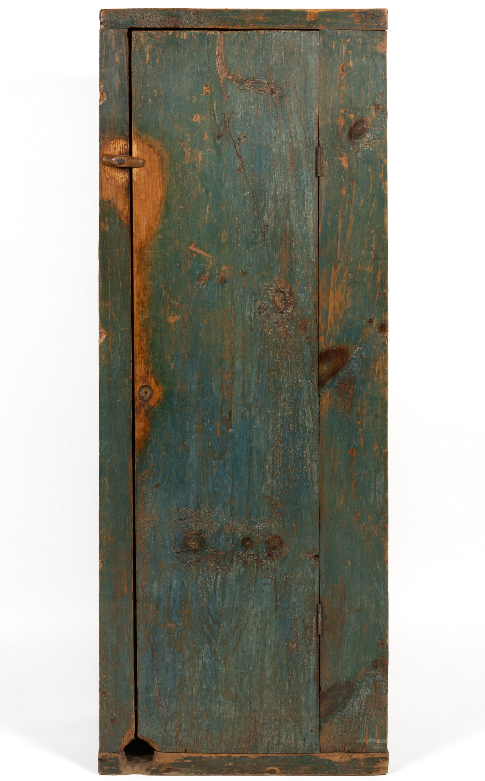 AMERICAN PAINTED PINE CHIMNEY CUPBOARD: AMERICAN PAINTED PINE CHIMNEY CUPBOARD, the narrow vertical form of diminutive size with single hinged plank door concealing four fixed shelves, retaining likely original turnbuckle, hinges, and