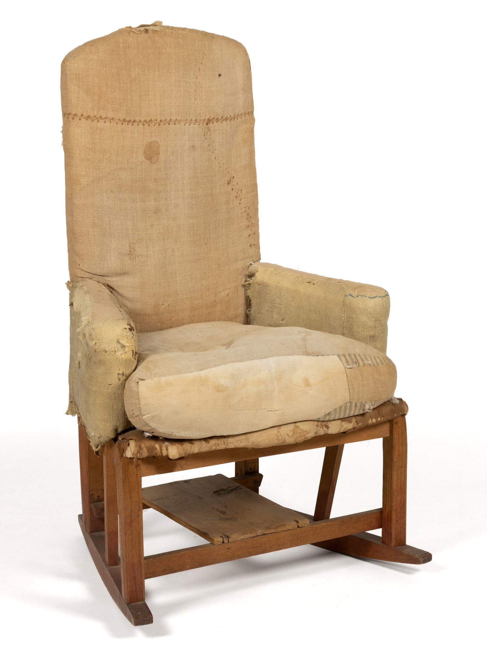 AMERICAN HOMESPUN-UPHOLSTERED MAKE-DO ROCKING NECESSARY CHAIR: AMERICAN HOMESPUN-UPHOLSTERED MAKE-DO ROCKING NECESSARY CHAIR, the arched back over shaped arms and a trapezoidal seat frame with a central hole with cover, the whole raised on square legs