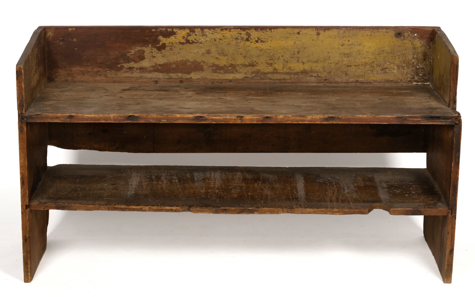 AMERICAN PAINTED PINE LOW BUCKET BENCH: AMERICAN PAINTED PINE LOW BUCKET BENCH, nailed construction, rectangular back over two deep rectangular shelves supported by solid ends with a sloped profile. Retains remnants of an early painted