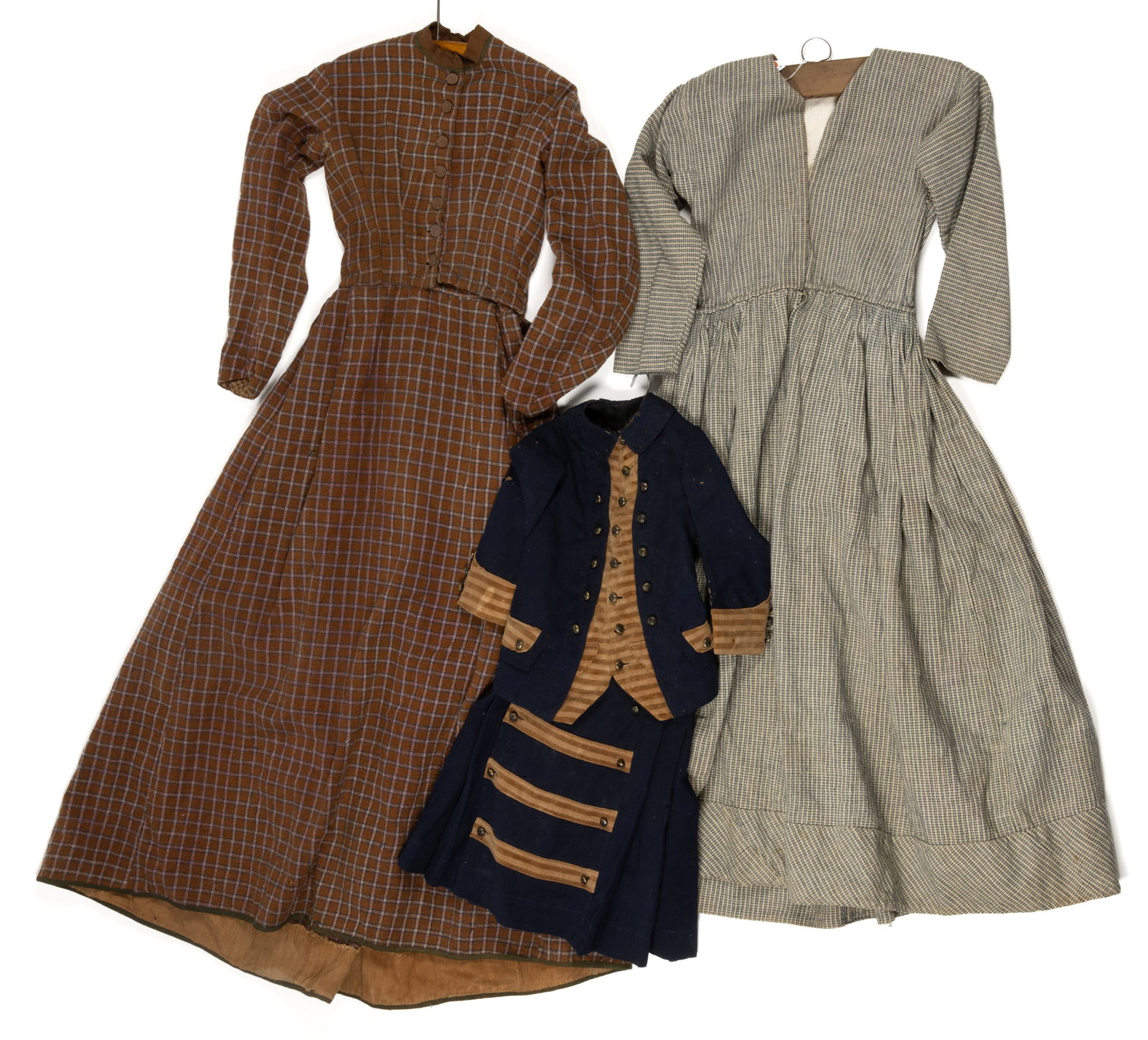 VICTORIAN / ANTIQUE LADY'S DRESSES AND GIRL'S ENSEMBLE, LOT OF THREE: VICTORIAN / ANTIQUE LADY'S DRESSES AND GIRL'S ENSEMBLE, LOT OF THREE, hand- and machine-stitched; comprising a lady's dress made of blue and white woven material, long sleeves, hook-and-ey