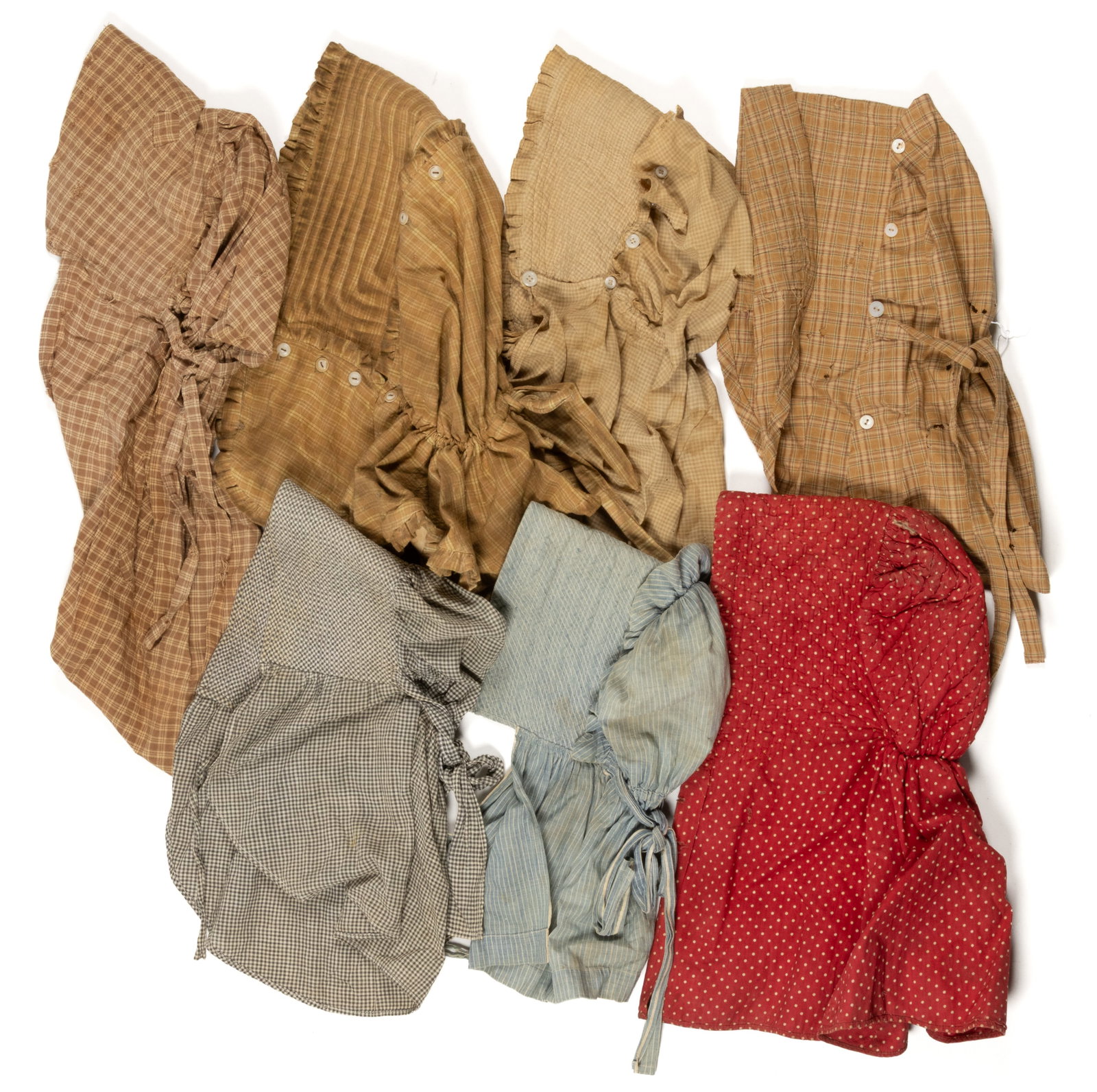 ANTIQUE / VINTAGE LADY'S BONNETS, LOT OF SEVEN: ANTIQUE / VINTAGE LADY'S BONNETS, LOT OF SEVEN, hand- and machine-stitched, each having quilted / stitched brim; comprising five made of plaid- / checkered-pattern woven fabrics; one with a blue a