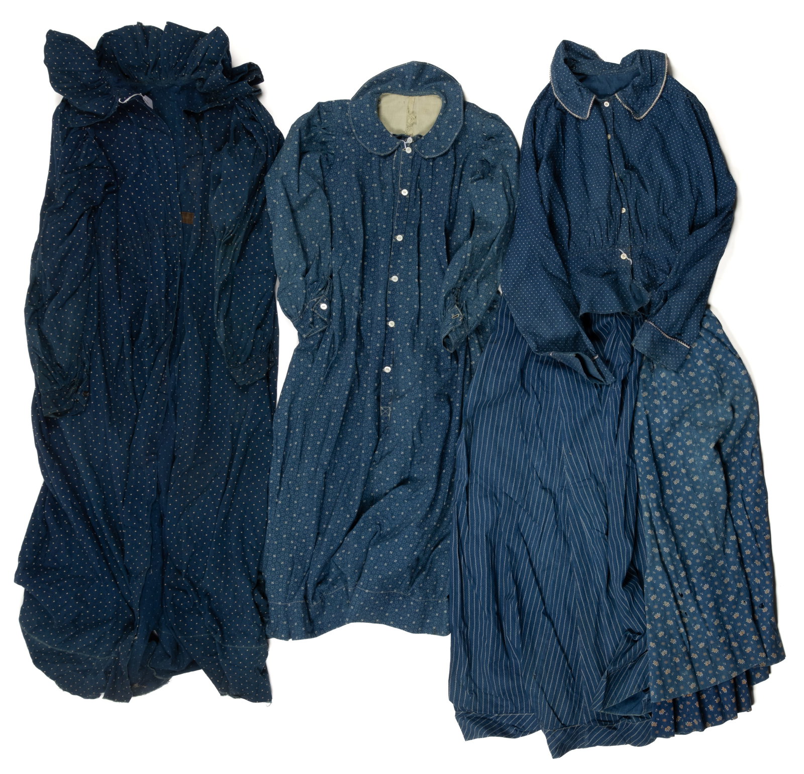 ANTIQUE / VINTAGE LADY'S CLOTHING, LOT OF FIVE: ANTIQUE / VINTAGE LADY'S CLOTHING, LOT OF FIVE, machine-stitched with hand-stitched detailing, each made of blue fabric with white print, comprising a shirt / bodice, two skirts, a dress, and a co