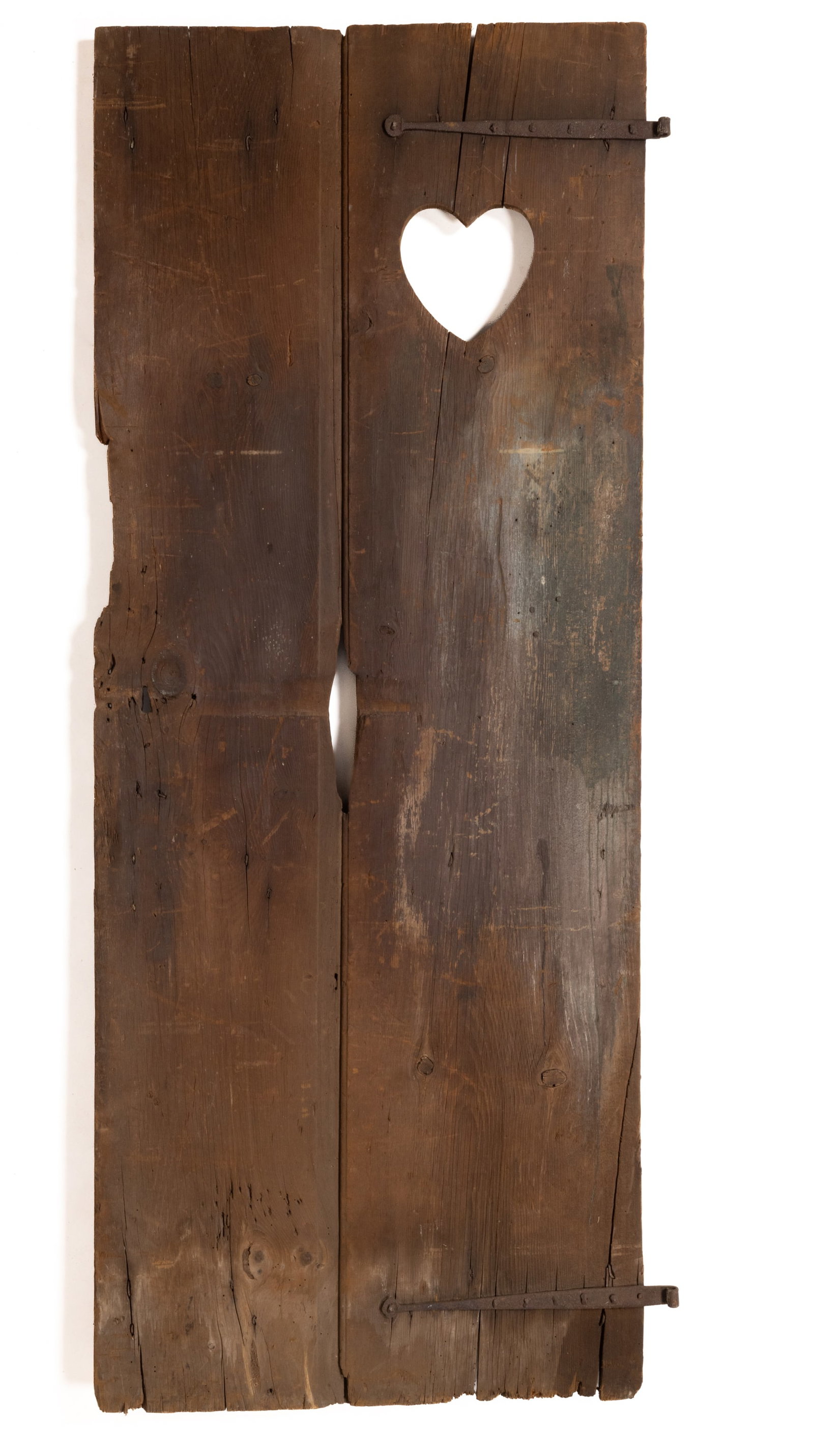 NEW ENGLAND PAINTED PINE DOOR WITH HEART CUT-OUT: NEW ENGLAND PAINTED PINE DOOR WITH HEART CUT-OUT, two-board form with a beaded edge at the center connection, heart cut-out in the upper right quadrant, retains the likely original diminutive strap hi