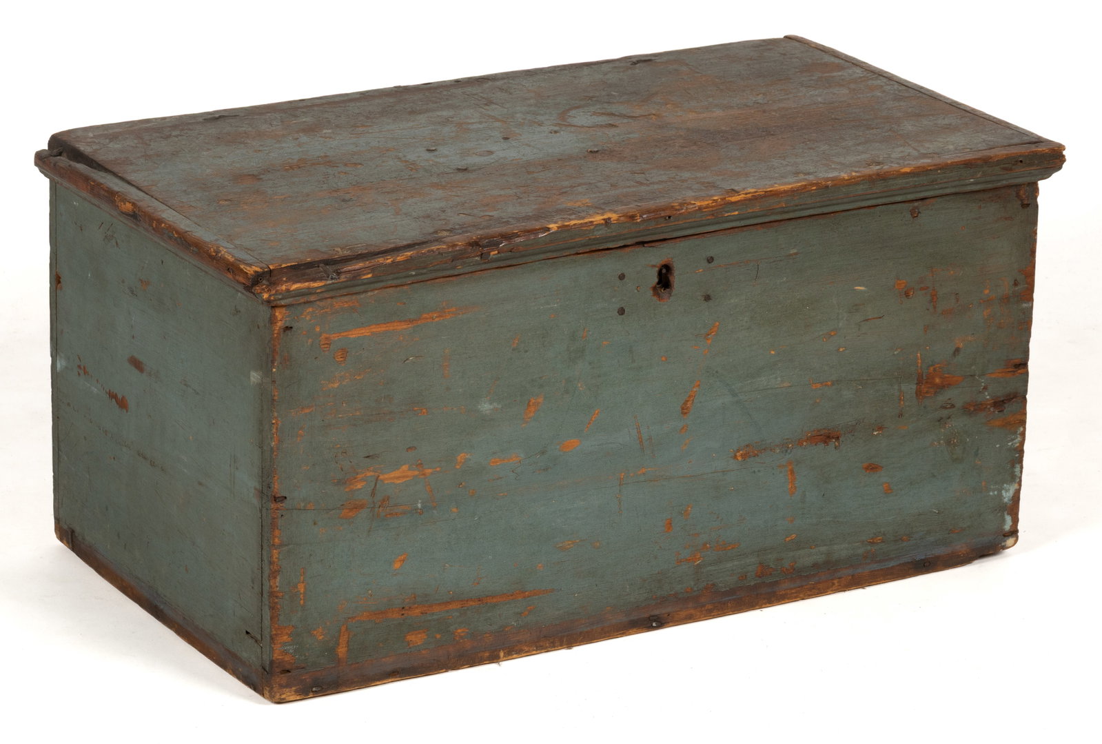 NEW ENGLAND PAINTED PINE BOX: NEW ENGLAND PAINTED PINE BOX, nailed construction, the rectangular hinged lid with an applied edge molding conceals an open interior. Retains the original lock, original snipe hinges, and an old paint