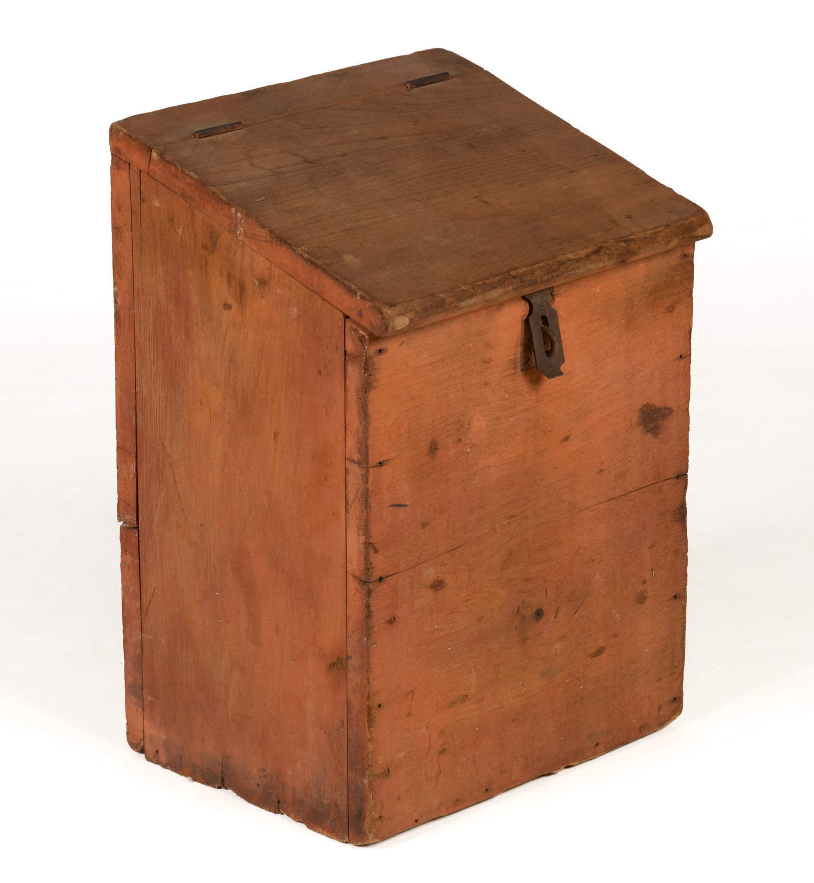 AMERICAN PAINTED POPLAR SLANT-TOP BIN: AMERICAN PAINTED POPLAR SLANT-TOP BIN, nailed construction, having a slanted top concealing an open interior. Retains an old red-washed surface, replacement iron hinges and hasp. Second half 19th