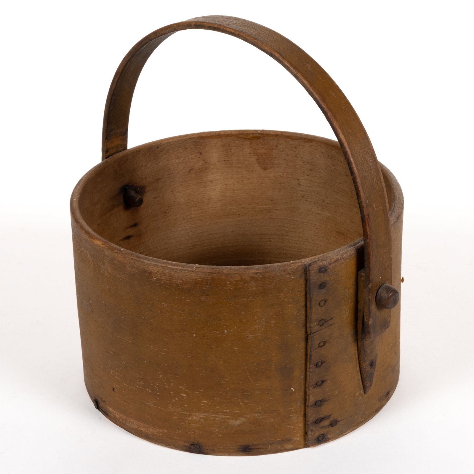 AMERICAN PAINTED BENTWOOD PANTRY BOX: AMERICAN PAINTED BENTWOOD PANTRY BOX, lapped constructed secured by tacks, with a bentwood handle attached to unusual carved nailed supports on the body. Retains a stellar original ochre painted 