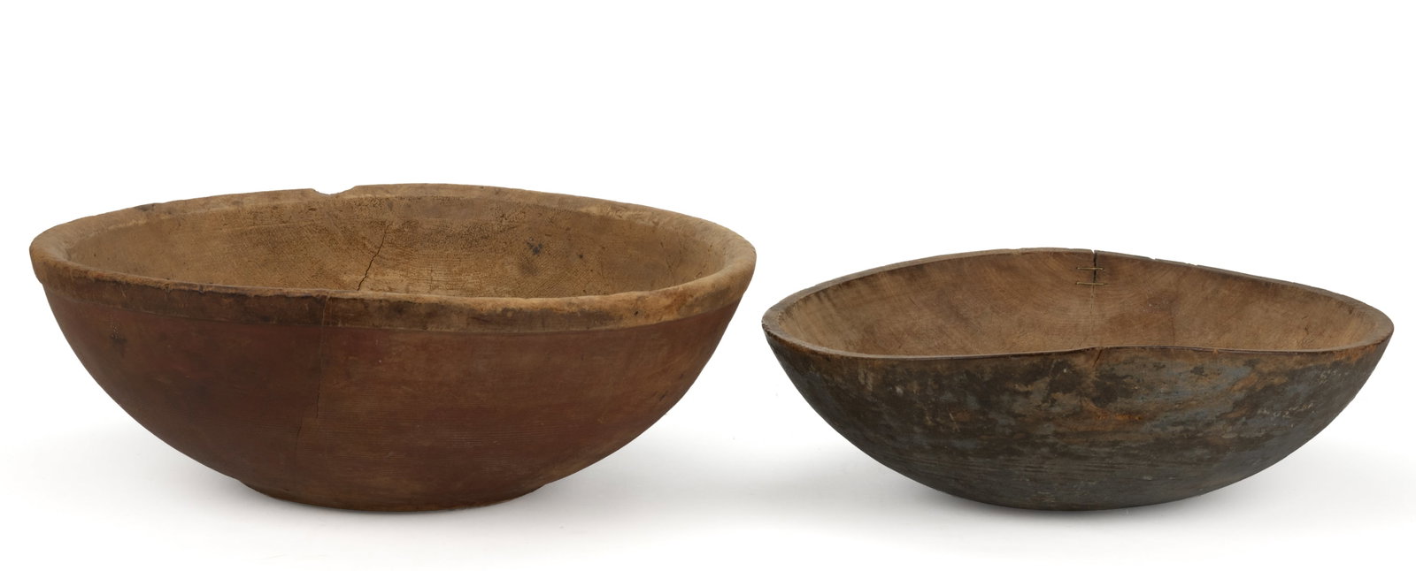 ASSORTED AMERICAN PAINTED LARGE TURNED TREEN BOWLS, LOT OF TWO: ASSORTED AMERICAN PAINTED LARGE TURNED TREEN BOWLS, LOT OF TWO, slightly out-of-round, including one example with a wide-banded rim, and one example having a slight foot. Each 