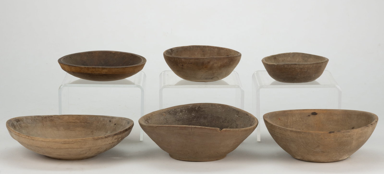 ASSORTED COUNTRY TURNED TREEN BOWLS, LOT OF SIX: ASSORTED COUNTRY TURNED TREEN BOWLS, LOT OF SIX, slightly out-of-round, including one example with a wide-banded rim, and three examples with lightly turned bands. Each having a na