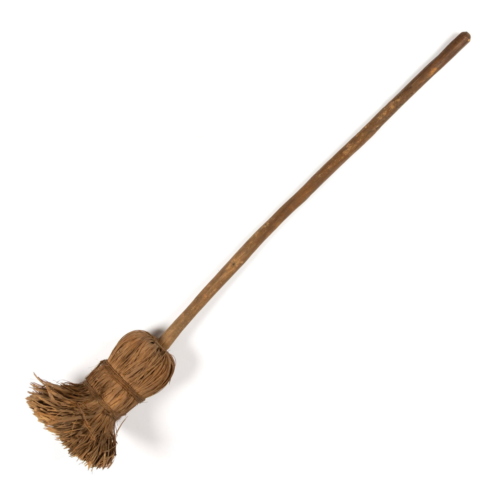 APPALACHIAN HICKORY SHAVED / SPLINT HEARTH BROOM: APPALACHIAN HICKORY SHAVED / SPLINT HEARTH BROOM, having a shaven handle with splints bent down and secured by two twine bands, retains the original dry surface. Late 19th/first quarter 20th