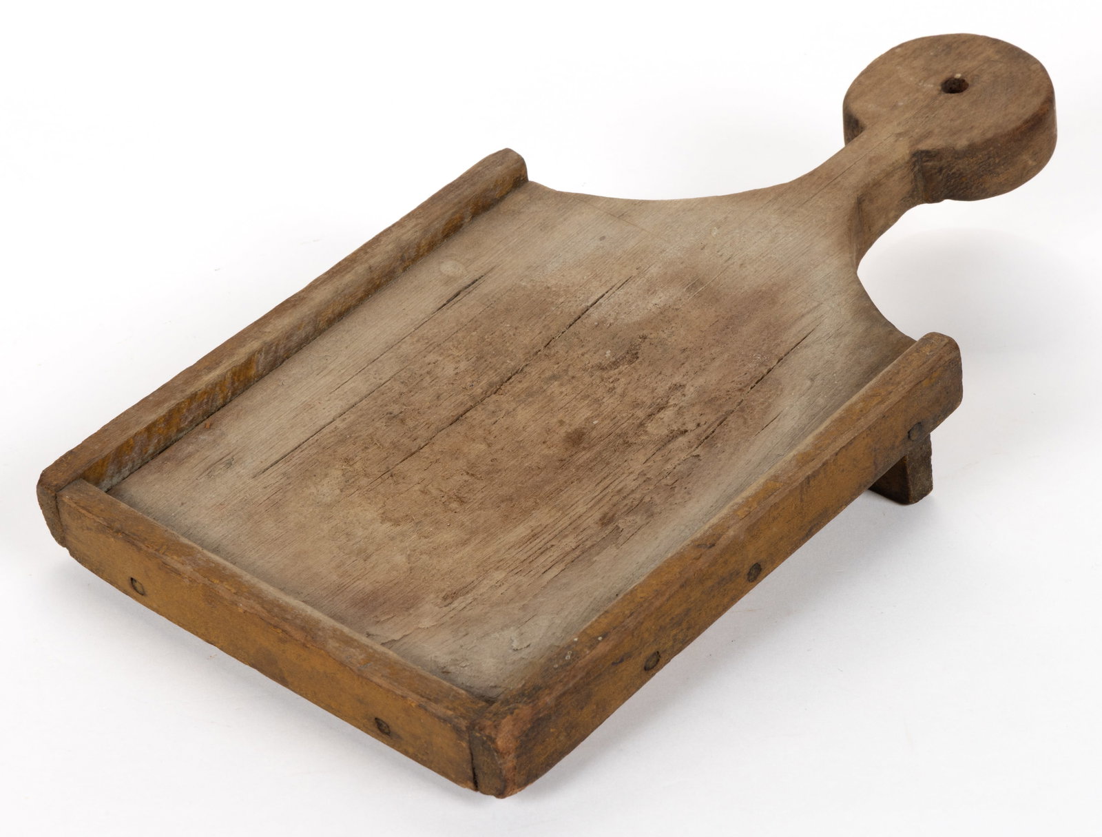 AMERICAN PAINTED DIMINUTIVE SCRUB BOARD: AMERICAN PAINTED DIMINUTIVE SCRUB BOARD, of strange small form with a projecting well-formed lollipop handle, the main body with a short nailed edge, the back with an applied foot to keep the board at